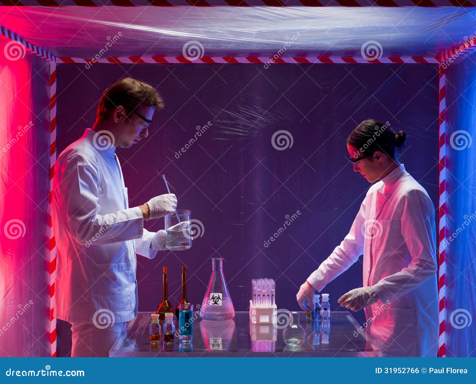 mixing chemicals in a containment tent