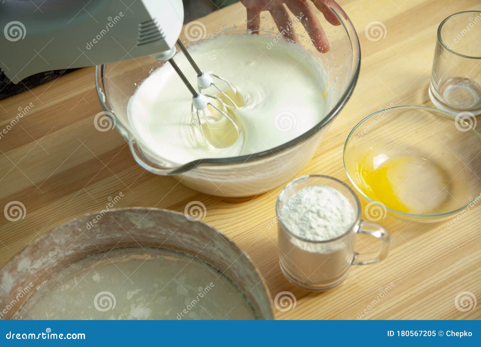 mixing wiped cream, making delicious cream for cupcake