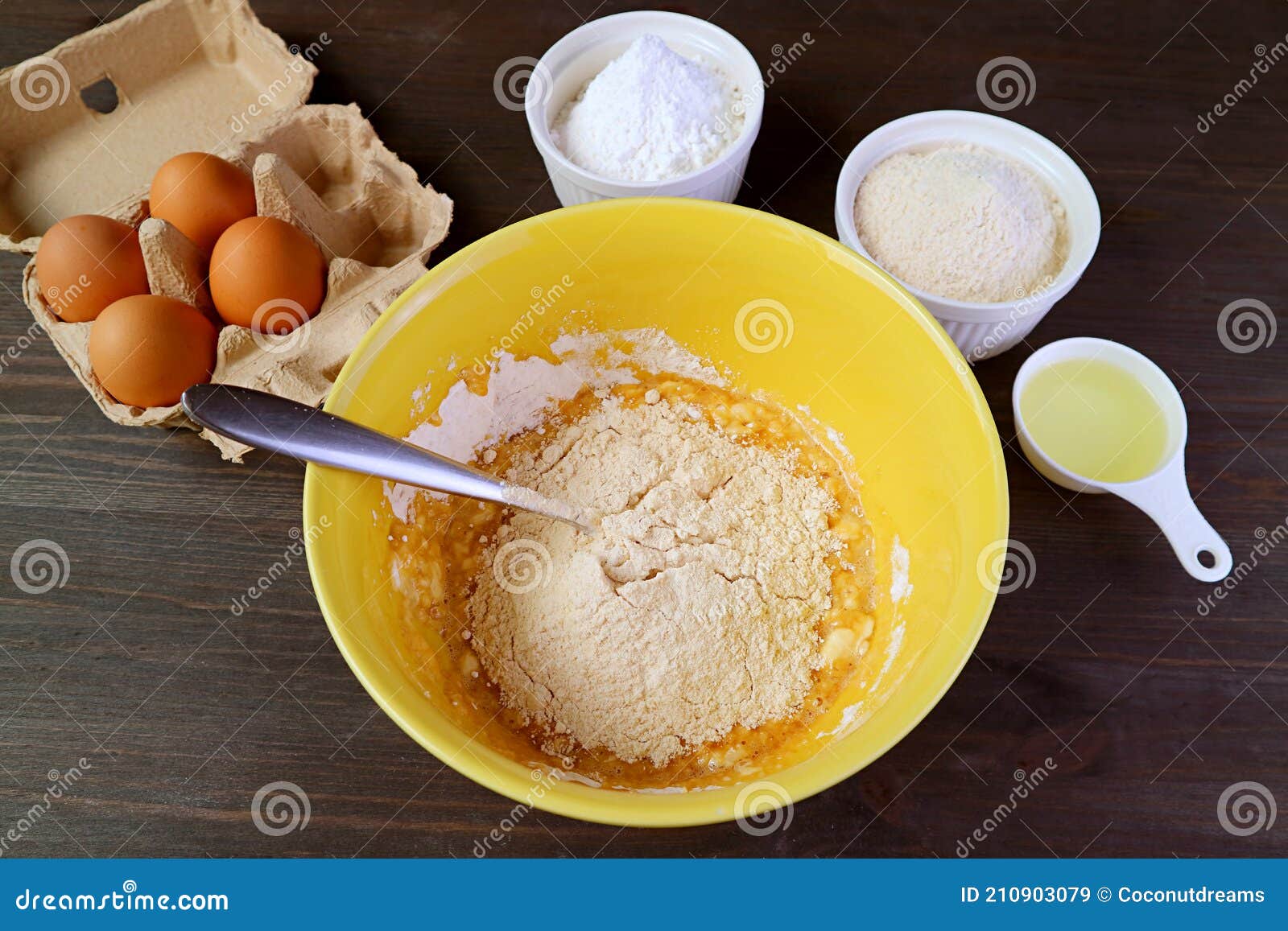 mixture in mixing bowl and with another ingredients for baking whole wheat cake