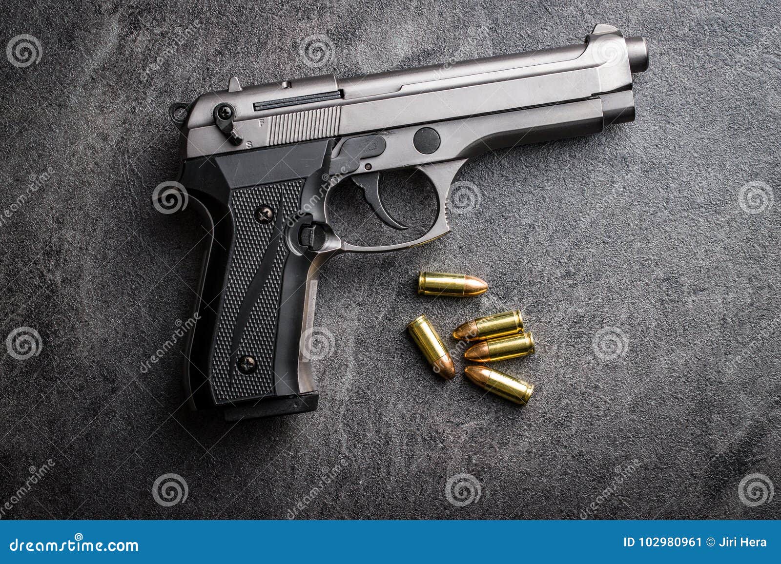 9mm pistol bullets and handgun.