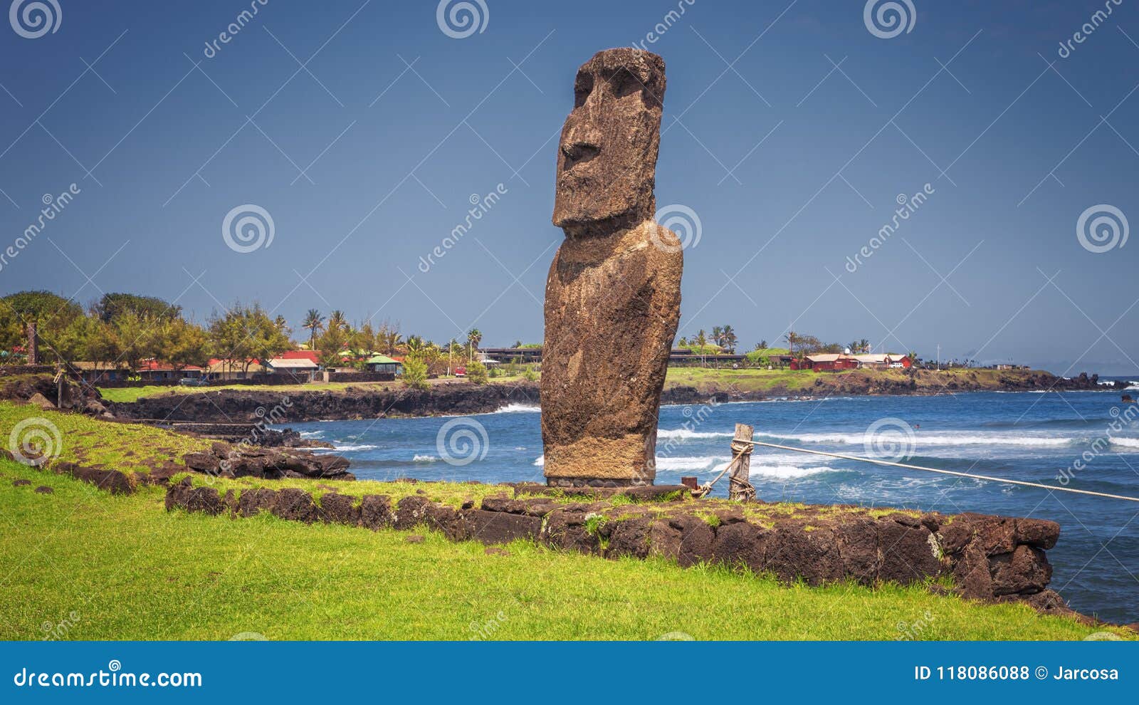 moai statue at the harbor on hanga roa, easter island, chile