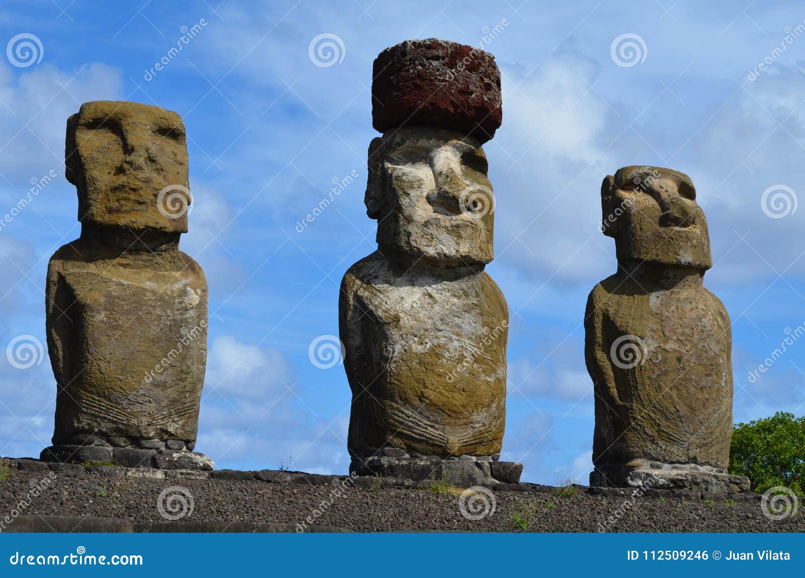 moais in the ceremonial platform ahu at tongariki beach, rapa nui easter island