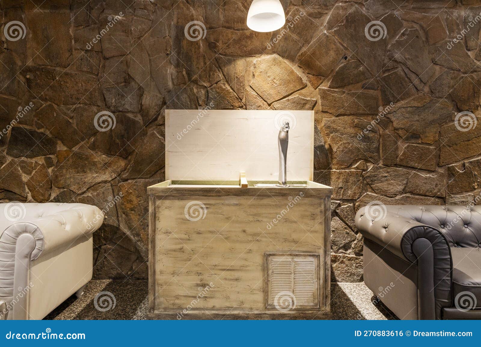 A Mobile Beer Tap on Wheels on a Wooden between Two Chester Sofas Stock Photo Image of