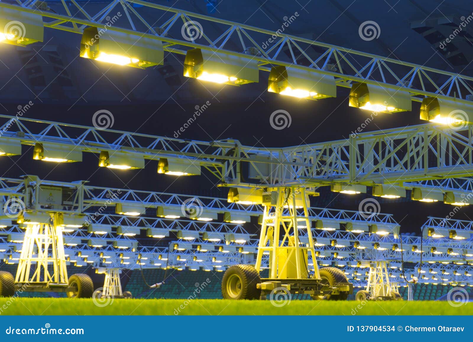 Mobile Grow Lighting System in Sports Stadium at Night. Stock Photo