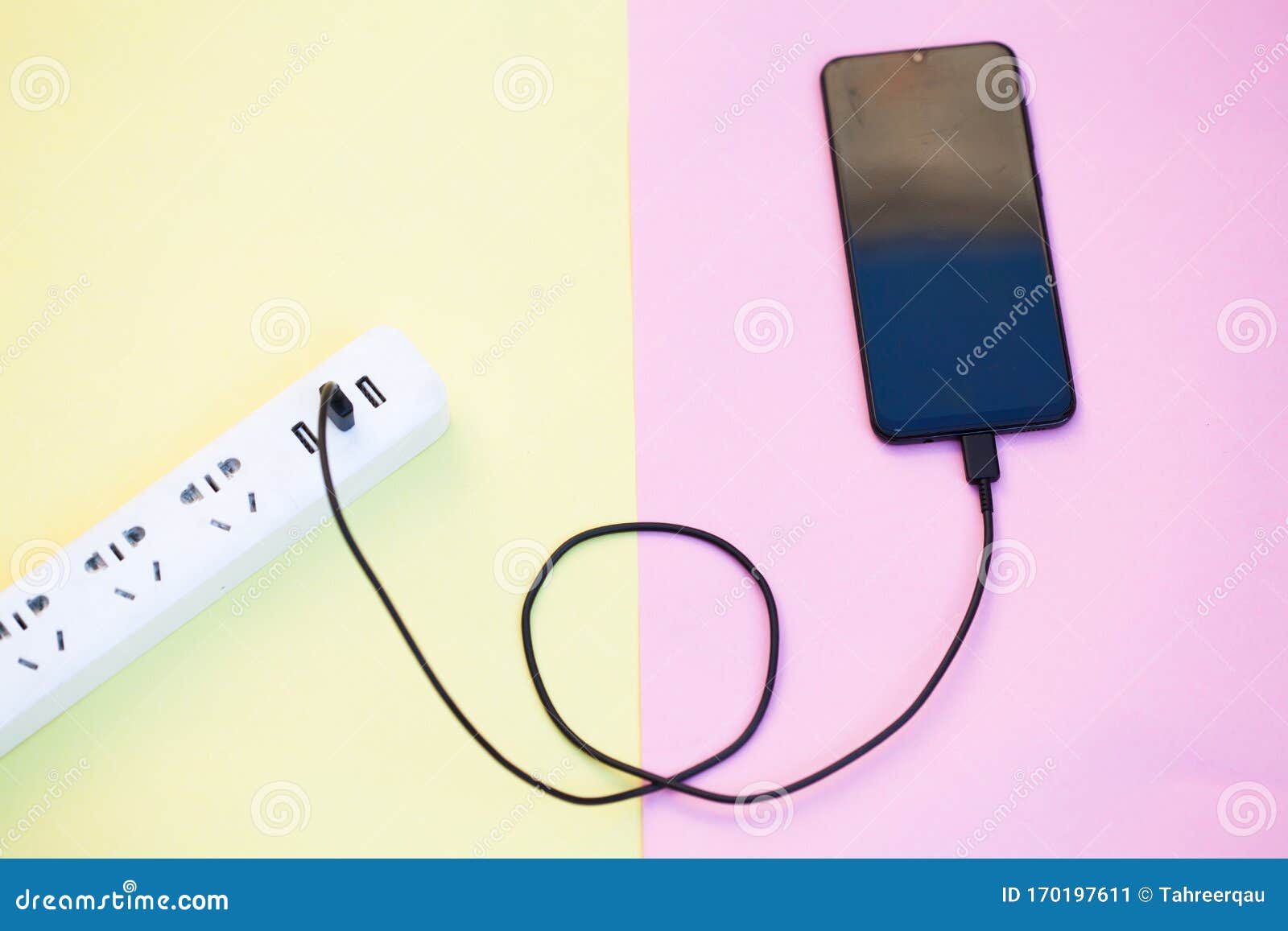 Mobile phone on charging stock image. Image of smart 170197611