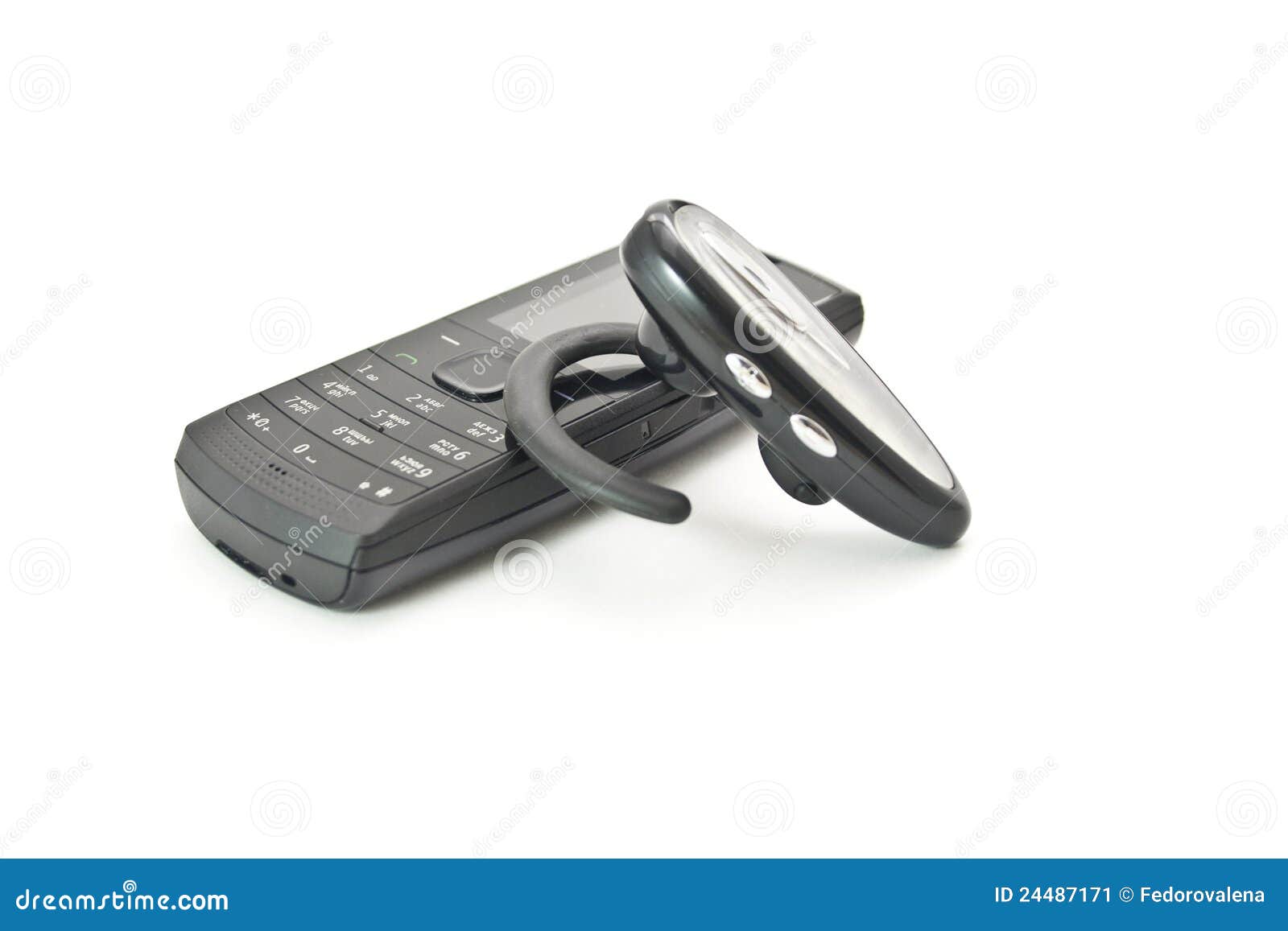 Mobile phone and headset stock image. Image of close 24487171