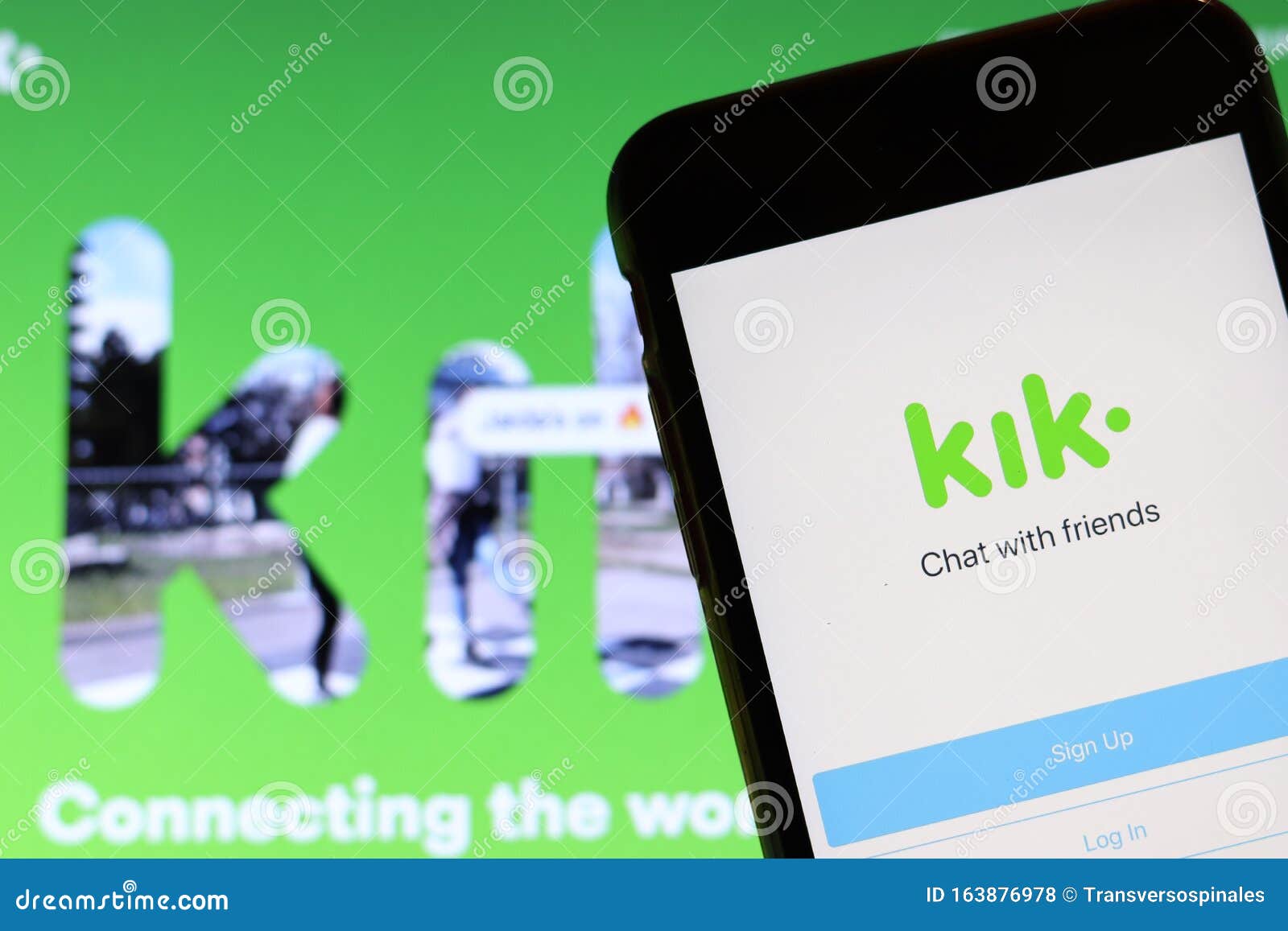 Mobile Phone with Kik Icon on Screen Close Up with Website on Laptop.  Blurred Background with Kik App Logo Editorial Stock Photo - Image of  display, popular: 163876978