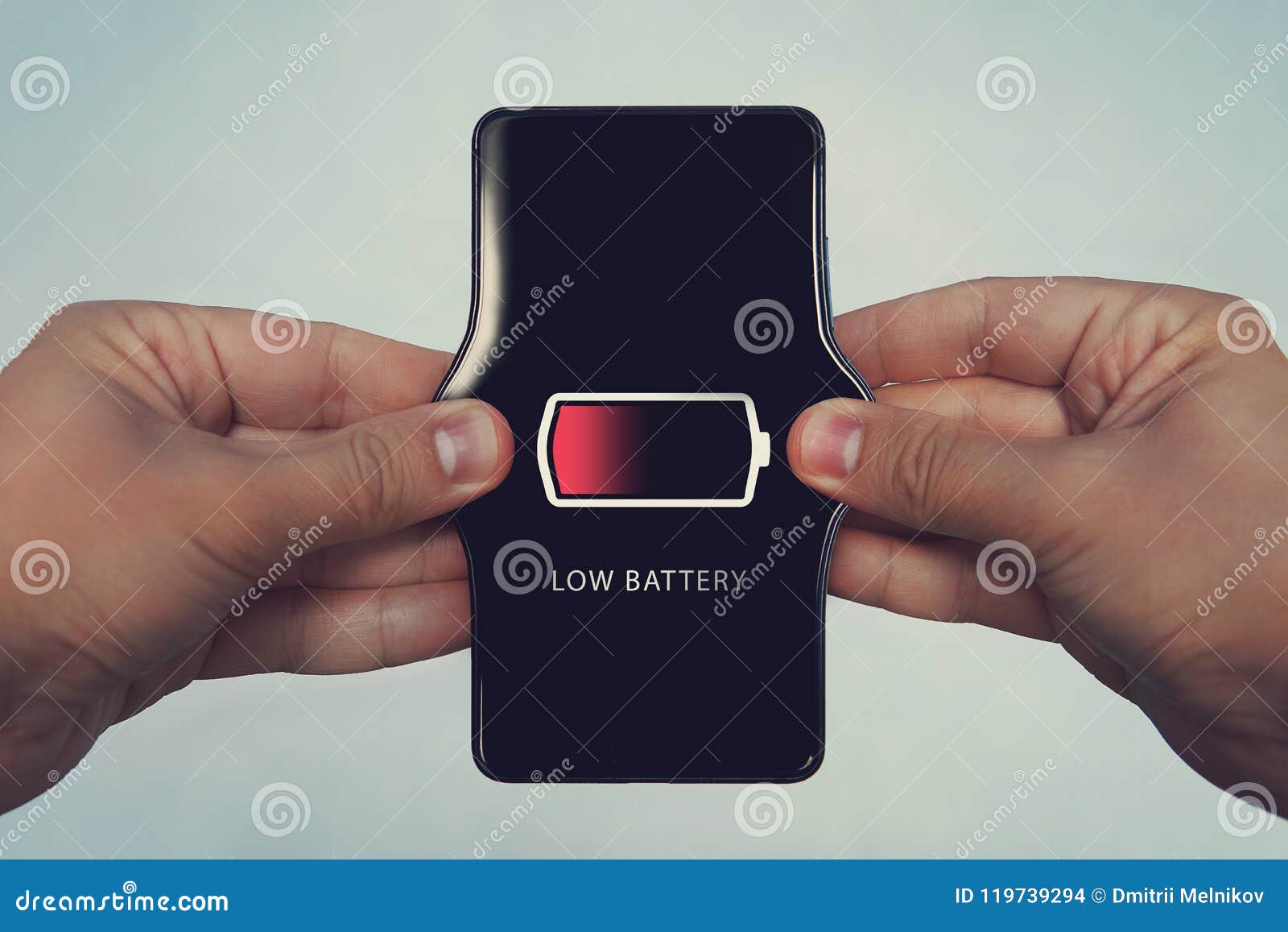 Mobile Phone with Low Battery on Screen. All Screen Graphics are Made Up.  Increase Battery Power, Weak Charge. Men S Hands Stretc Stock Photo - Image  of increase, charger: 119739294