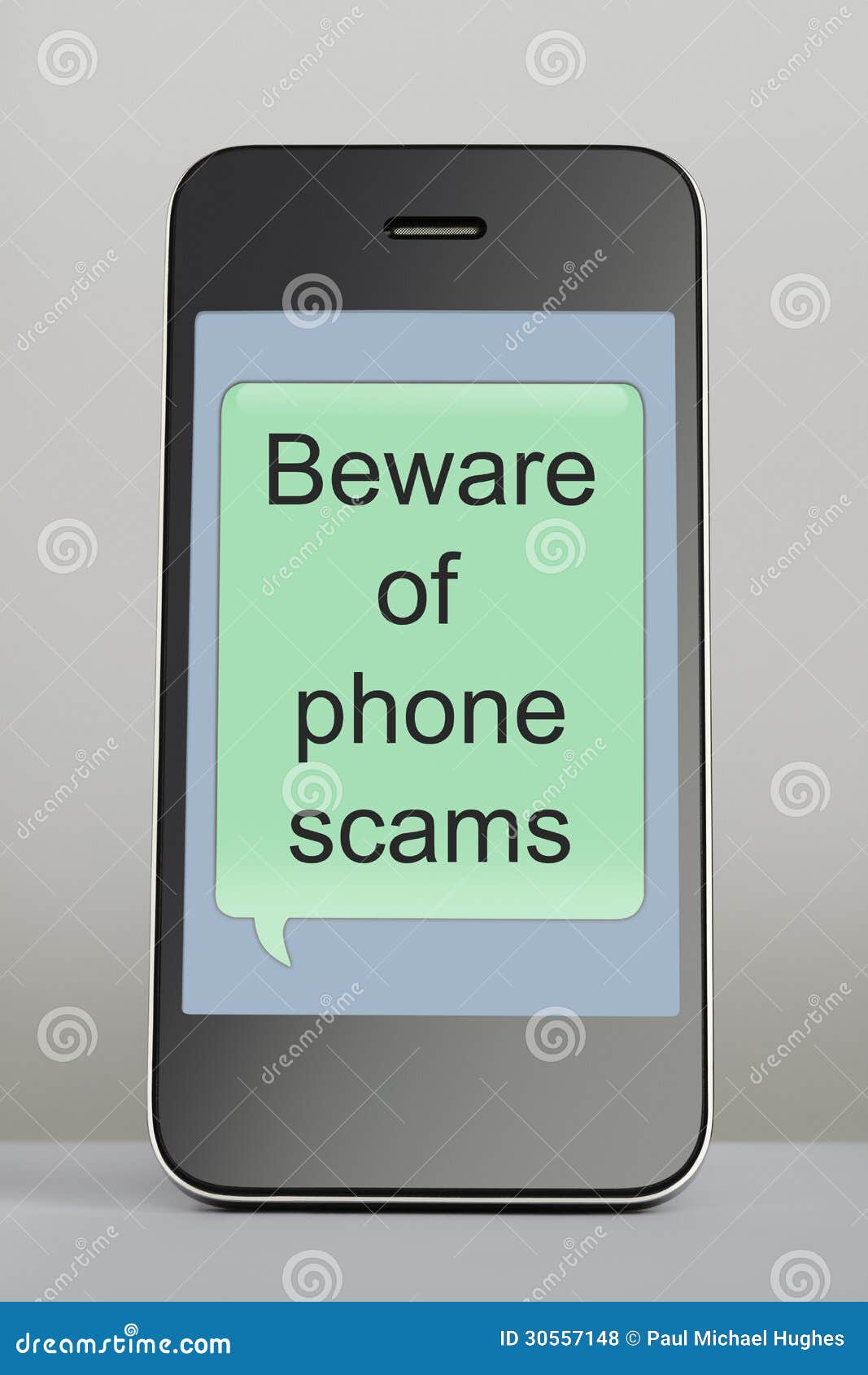 mobile phone with scam message speech bubble