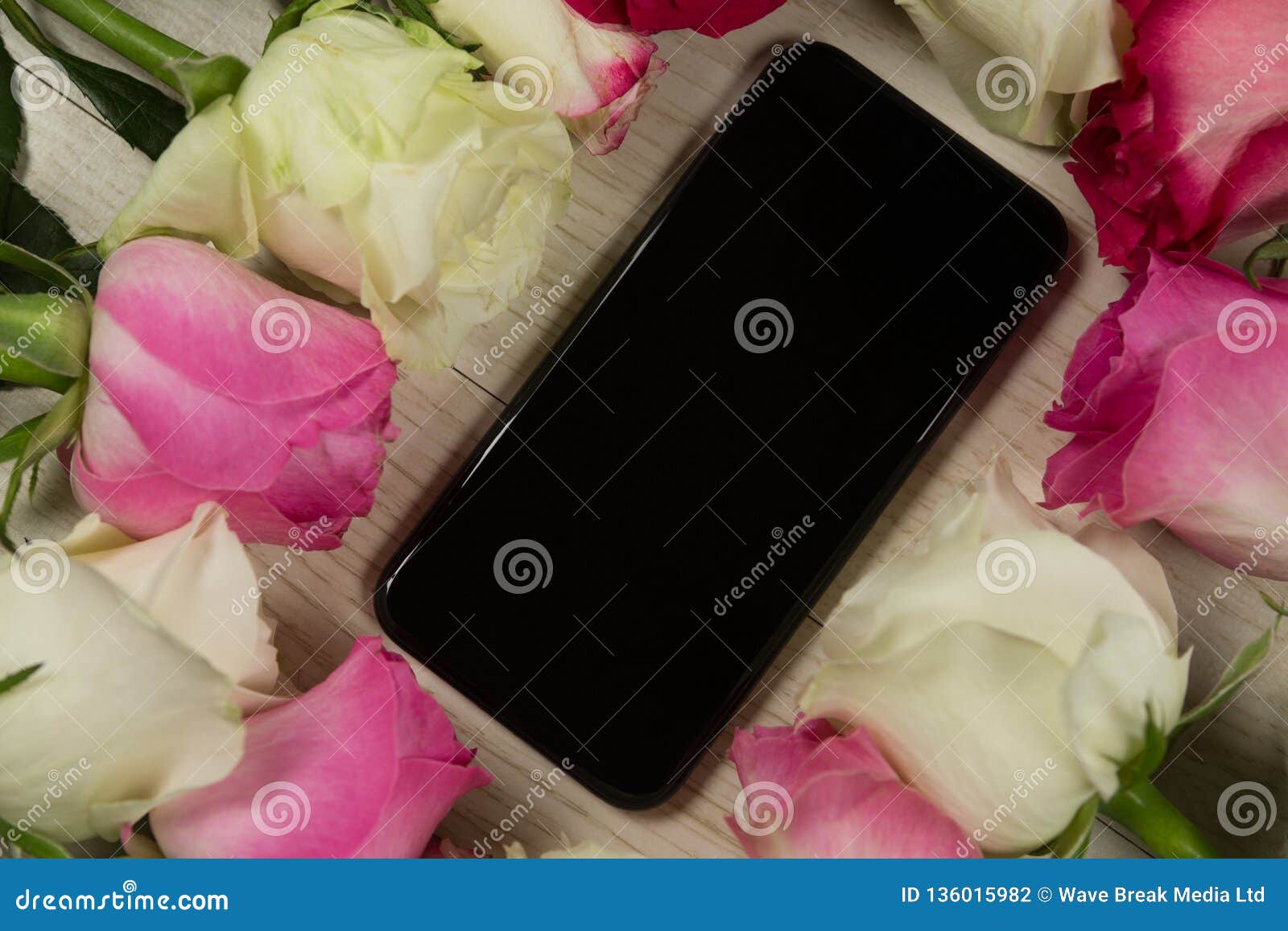 Mobile Phone Surrounded with Rose Flower Stock Photo Image of