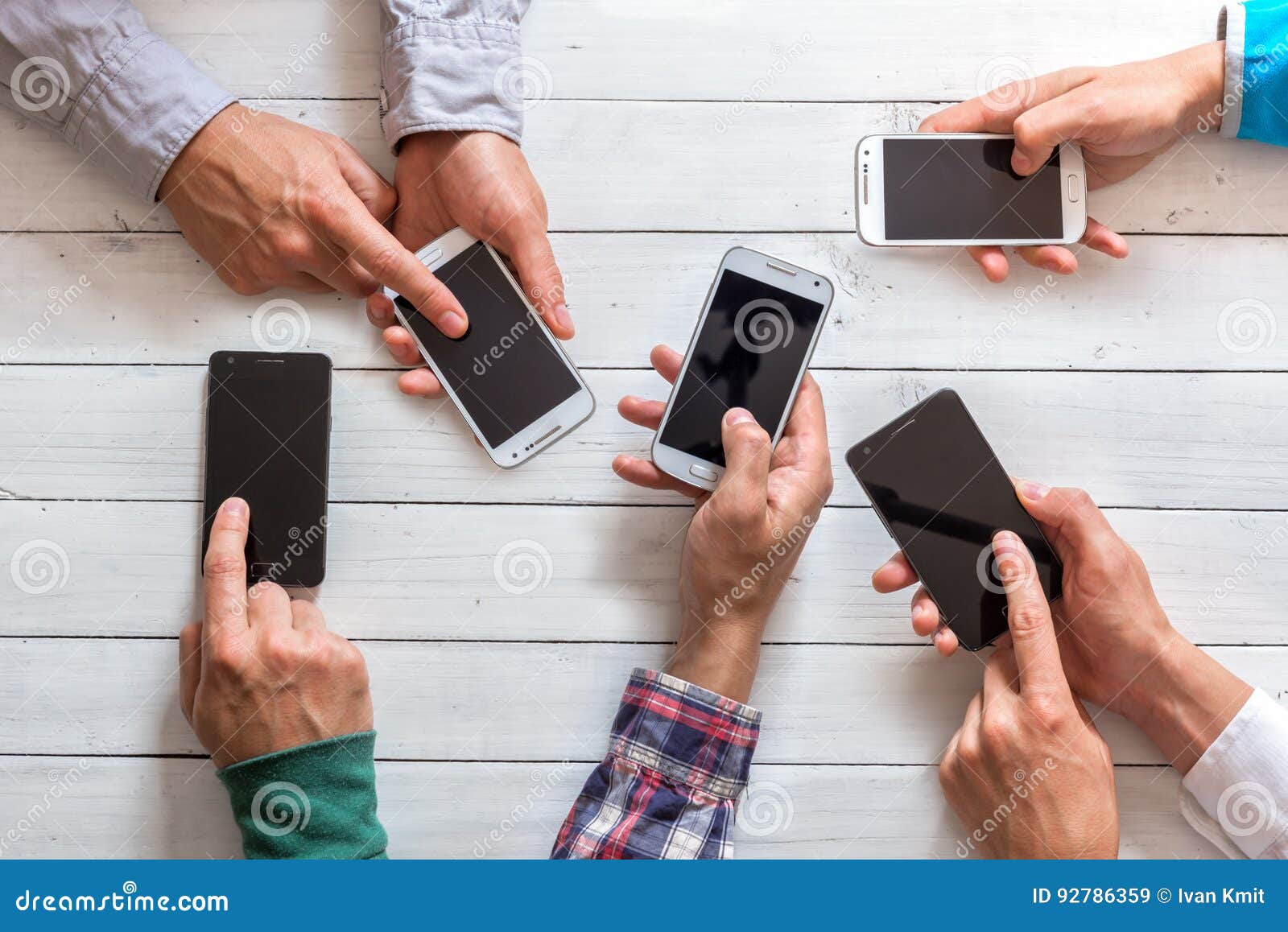 mobile phones in friends hand