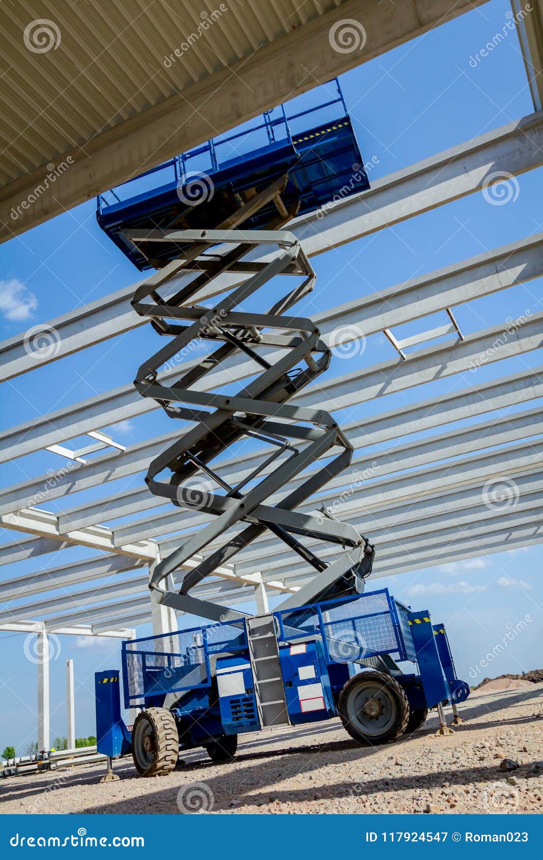 Mobile Scaffold, Stretched Scissor Lift Platform at Construction Stock