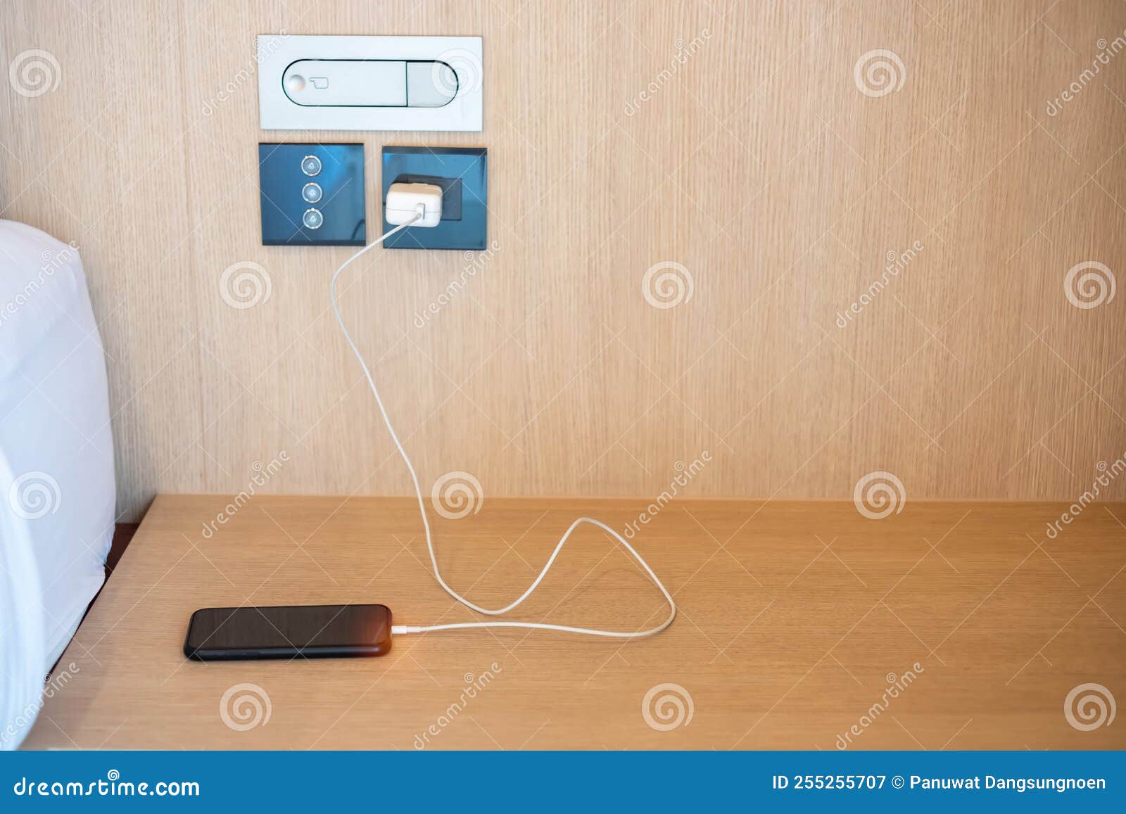 Mobile Smartphone Charging Battery on Table at Home or Office