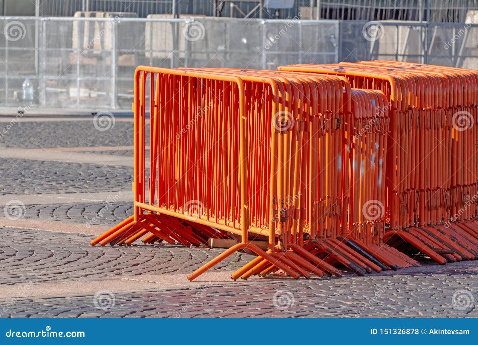mobile steel fence. orange street barriers to restrict movement before the concert