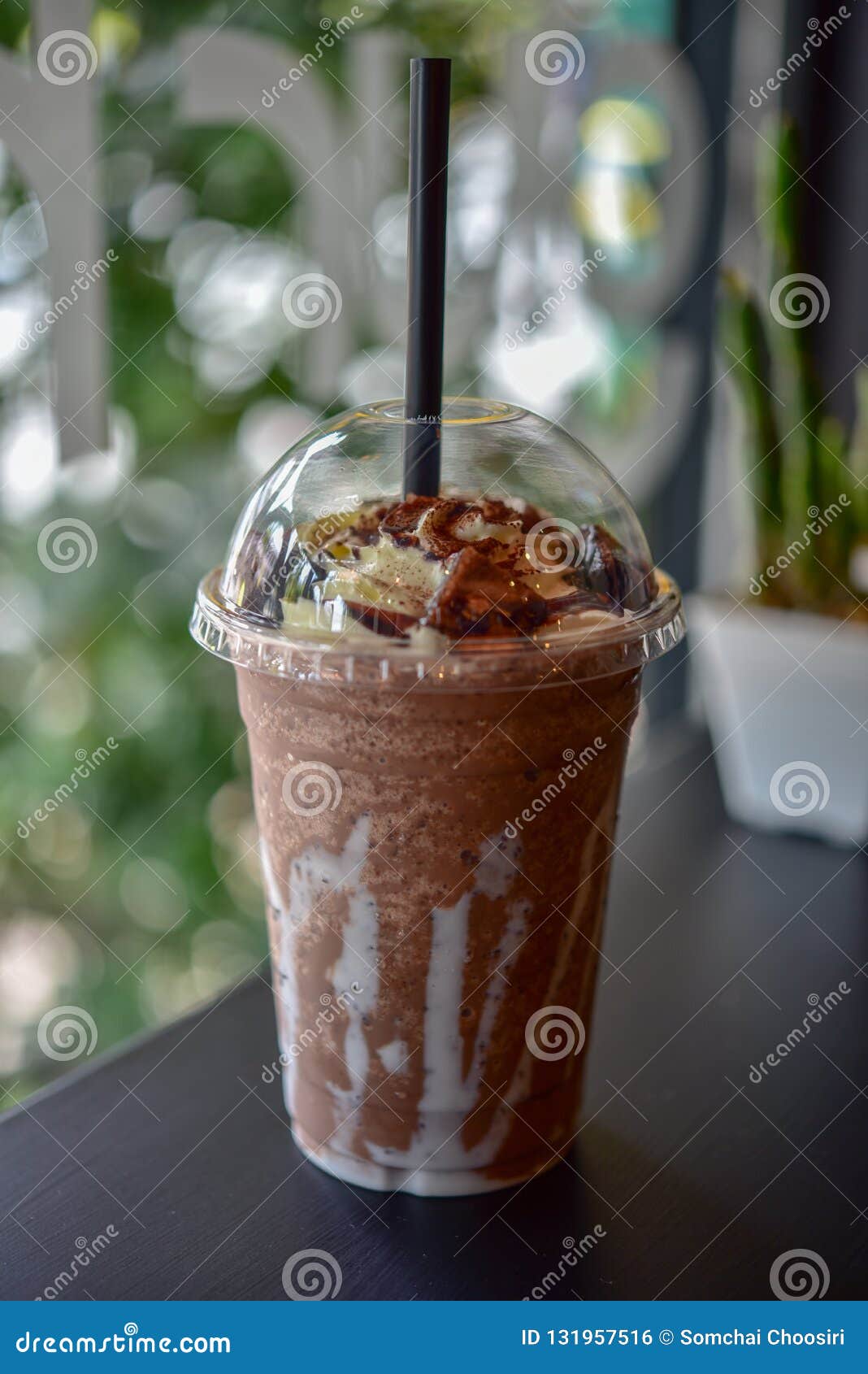 chocolate smoothie milkshake with jar in cafe