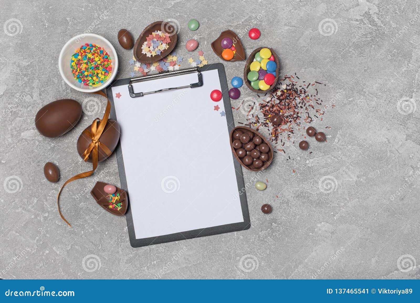 Download Mock Up Of Clipboard And Chocolate Traditional Easter Eggs With Bright Colorful Dragee Stock ...
