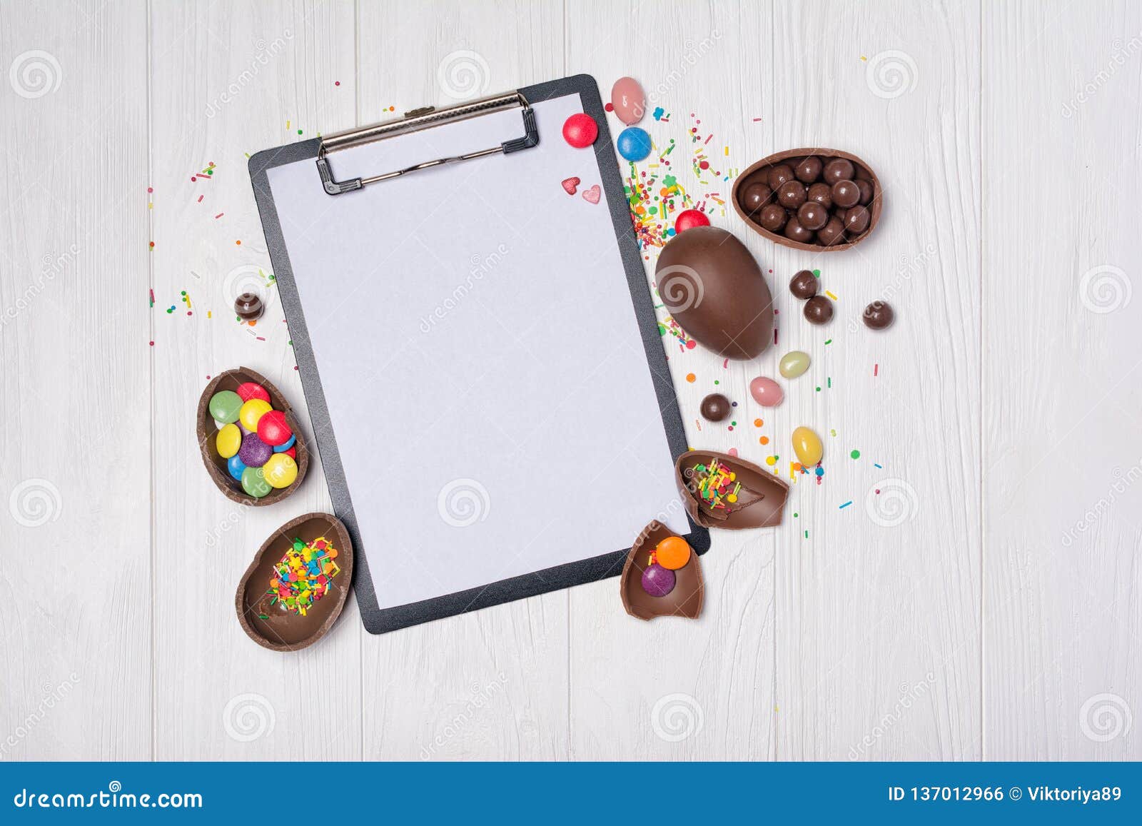 Download Mock Up Of Clipboard And Chocolate Traditional Easter Eggs With Bright Colorful Dragee Stock ...