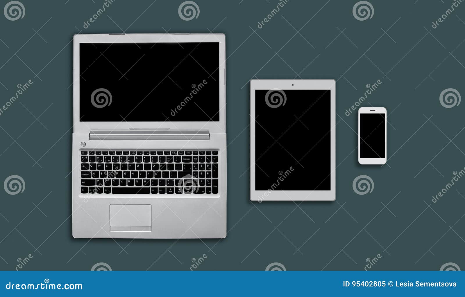 mock up of office desk with laptop, tablet and smartphone. top view of modern gadgets laying on flat surface. up-to-date apps. tec