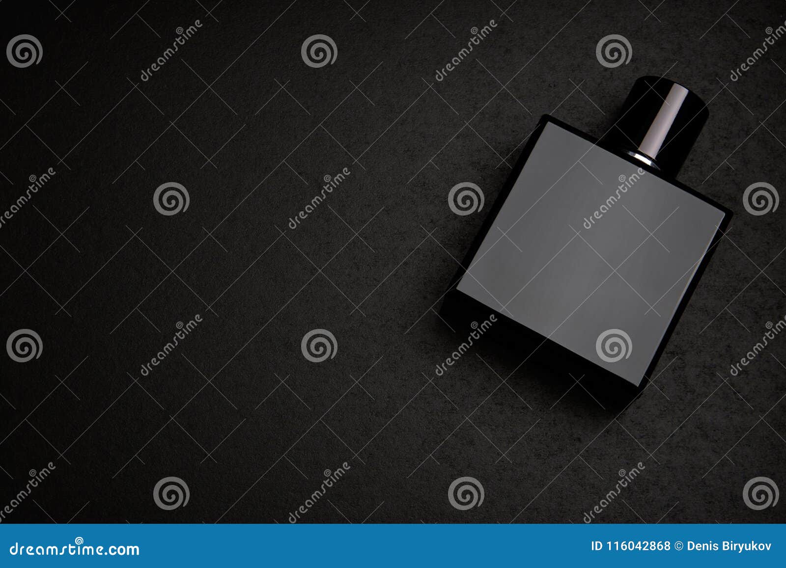 Download Mockup Of Black Fragrance Perfume Bottle Mockup On Dark ...