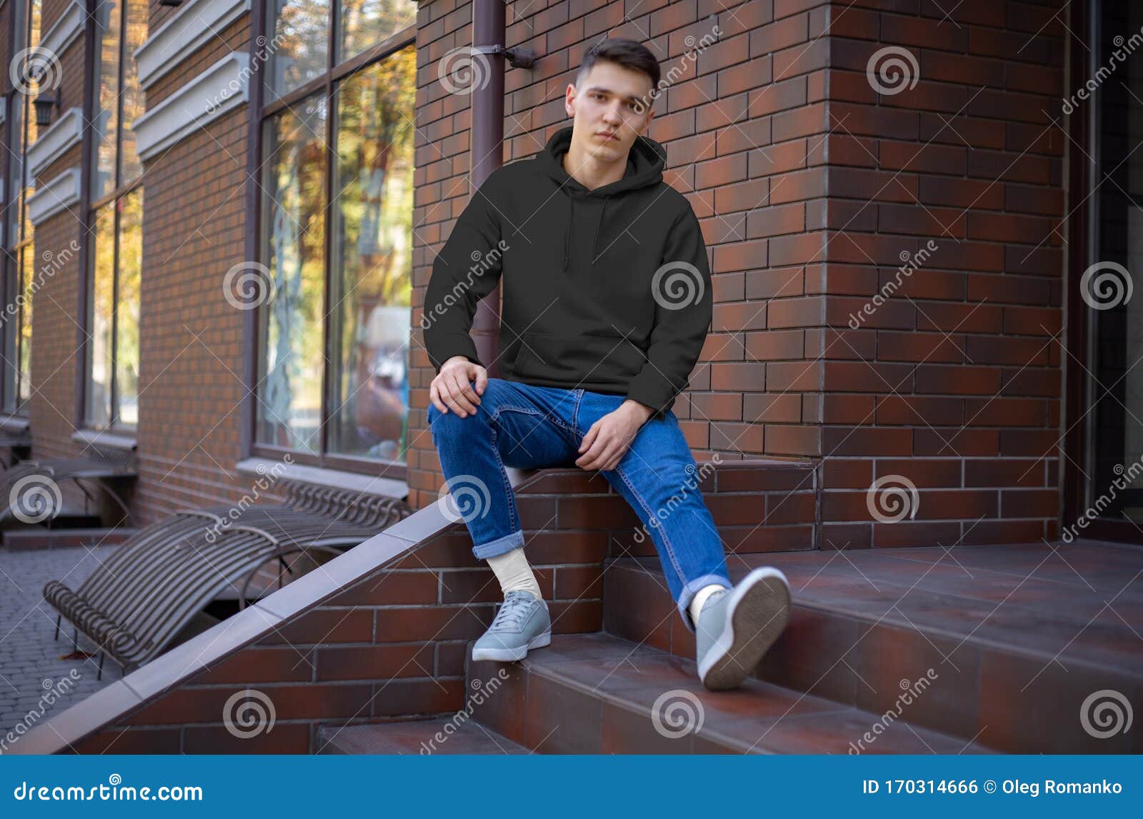Download Mockup Of A Black Hoodie On A Young Guy, Front View ...