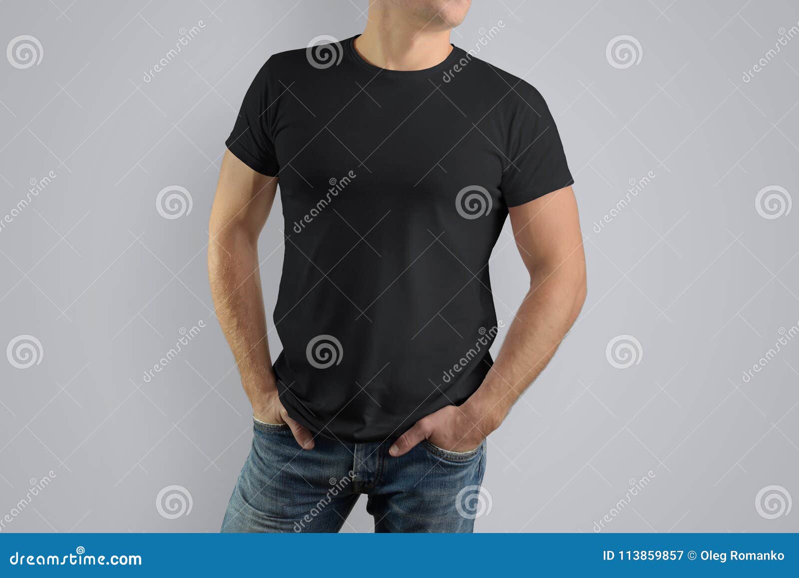 Download Mockup Black T-shirt On A Strong Man In Blue Jeans. Stock ...