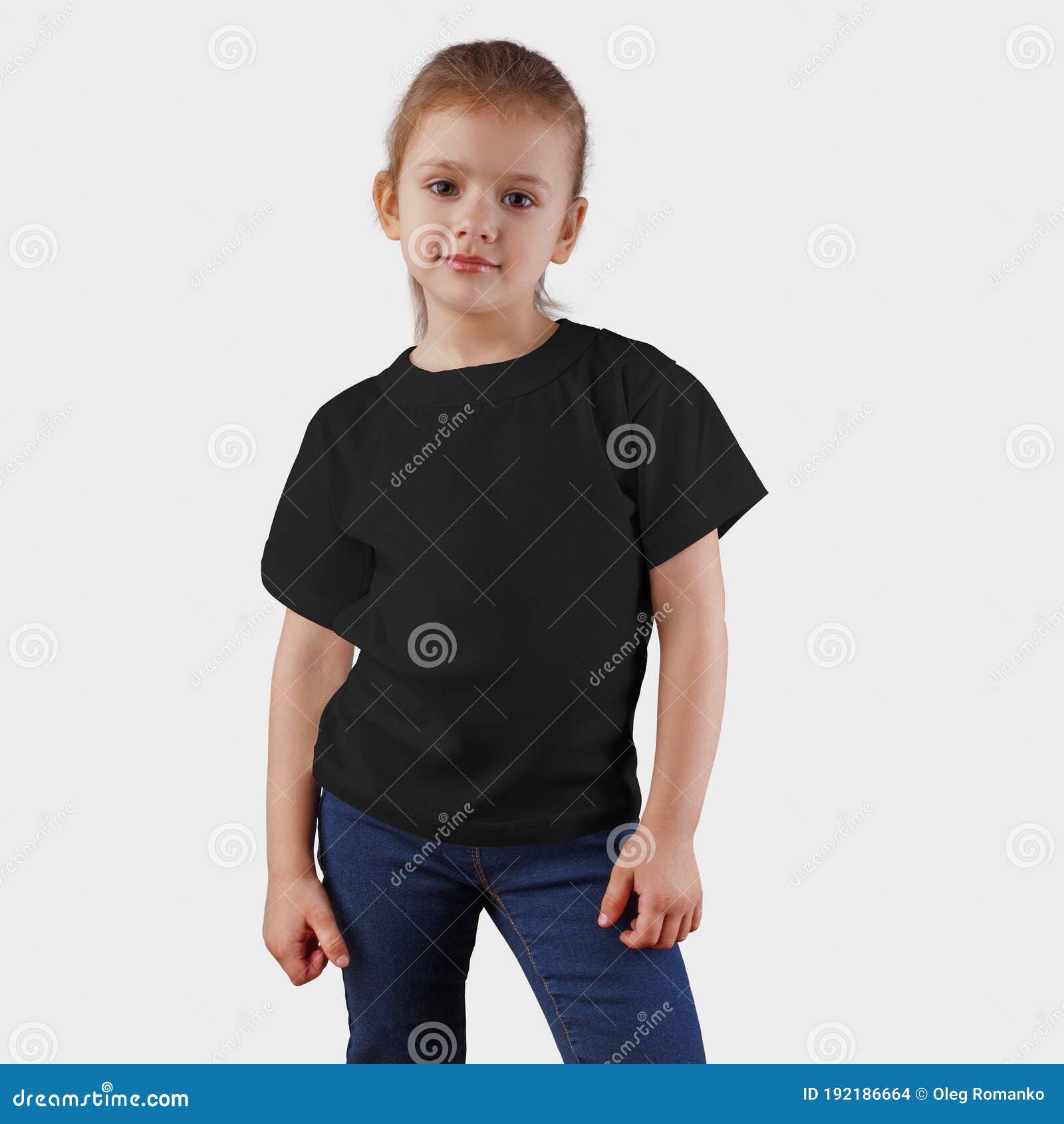 Download Mockup Blank T Shirts On A Beautiful Girl Posing Face Black Clothing For Children For Presentation Of Design And Print Stock Photo Image Of Black Cute 192186664