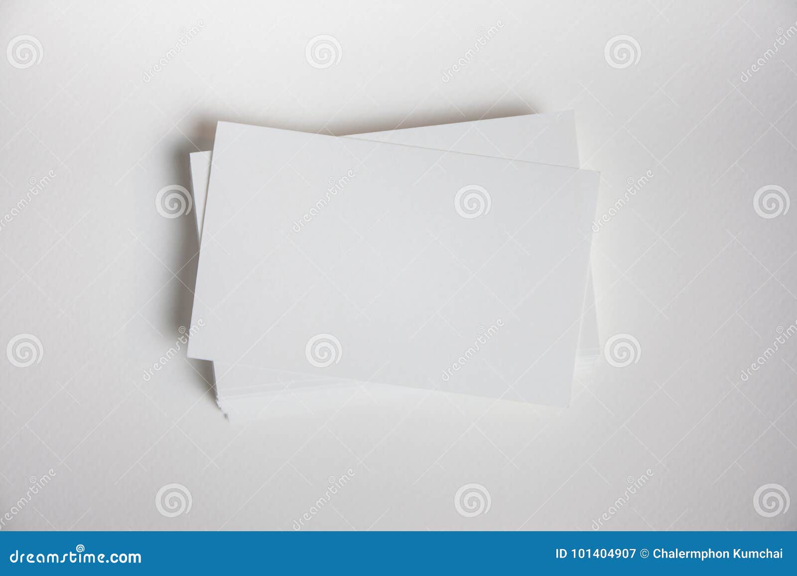 Download Mockup Of Business Cards Fan Stack At White Textured Paper Background. Stock Image - Image of ...