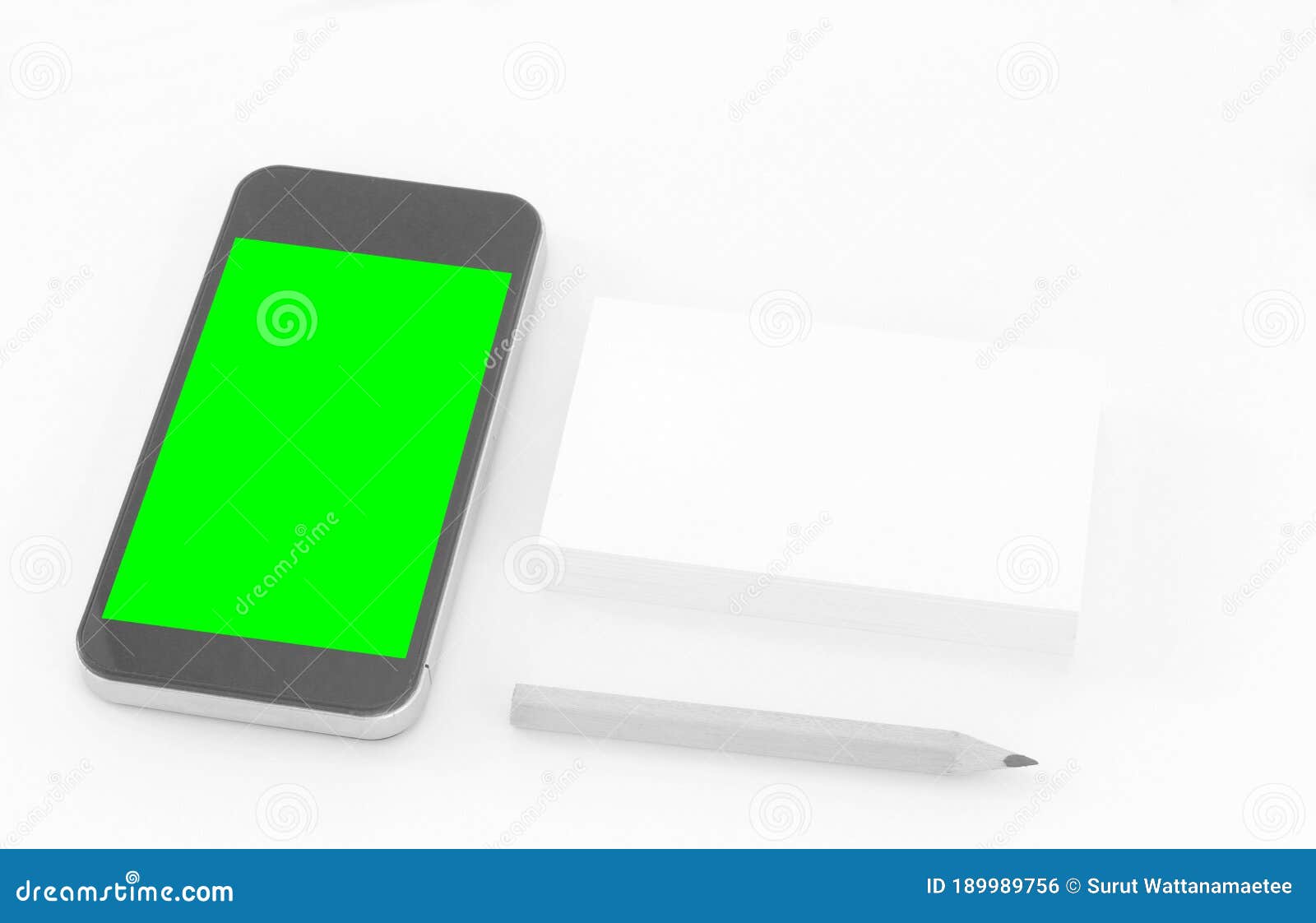 mockup of business cards with smart phone on white textured paper background