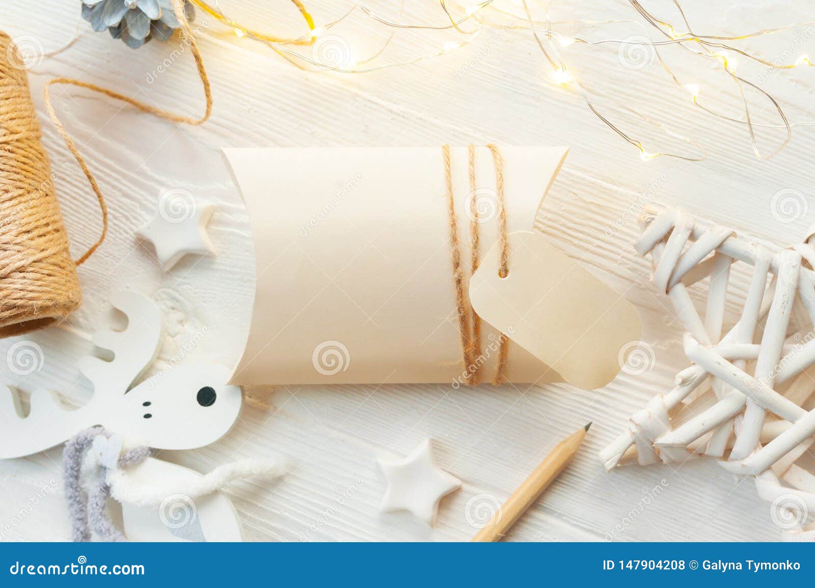 Download Mockup Christmas Kraft Gift Boxes With Tag On Wooden Background. Top View For Greeting Card ...