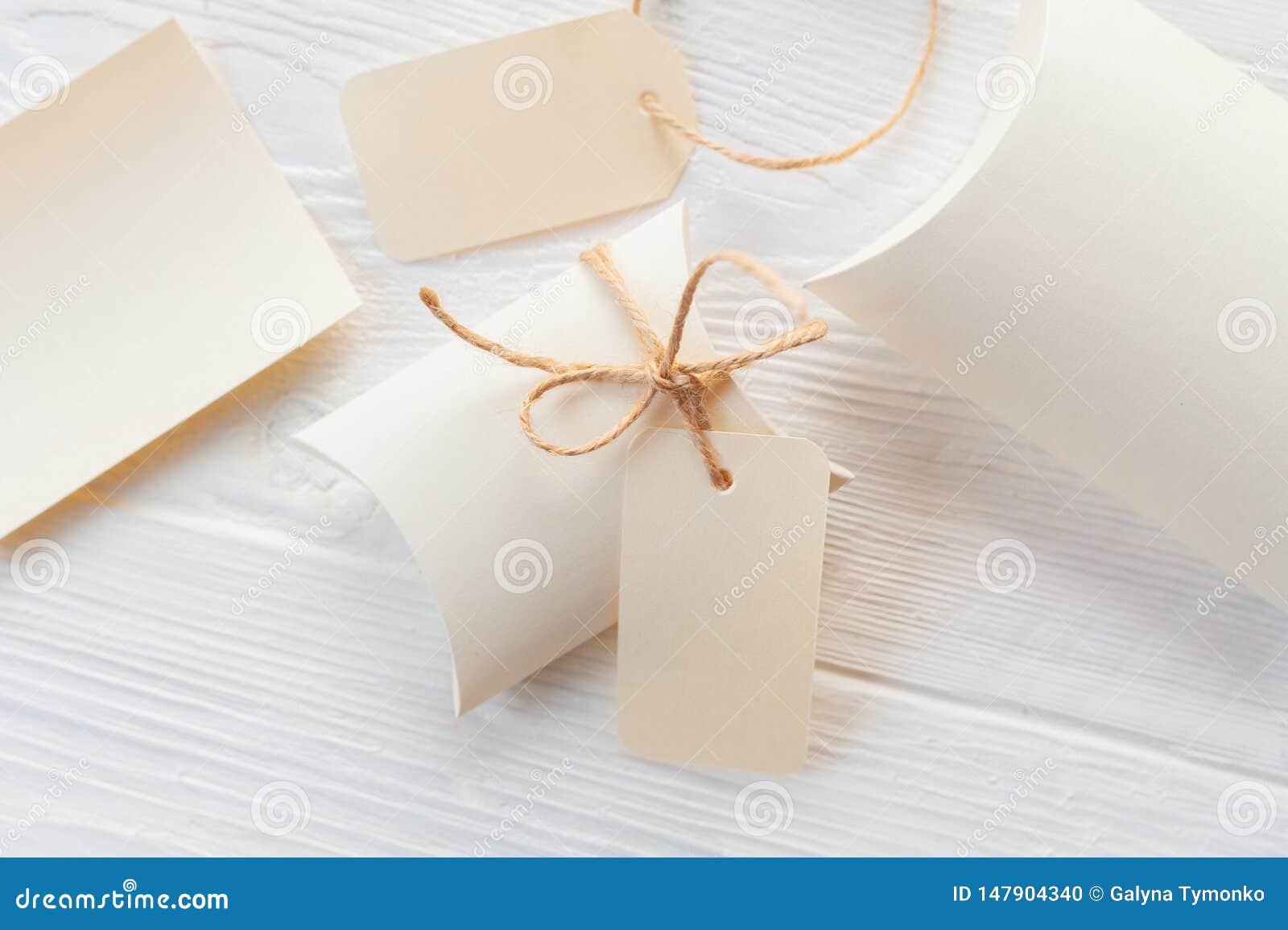 Download Mockup Christmas Kraft Gift Boxes With Tag On Wooden ...