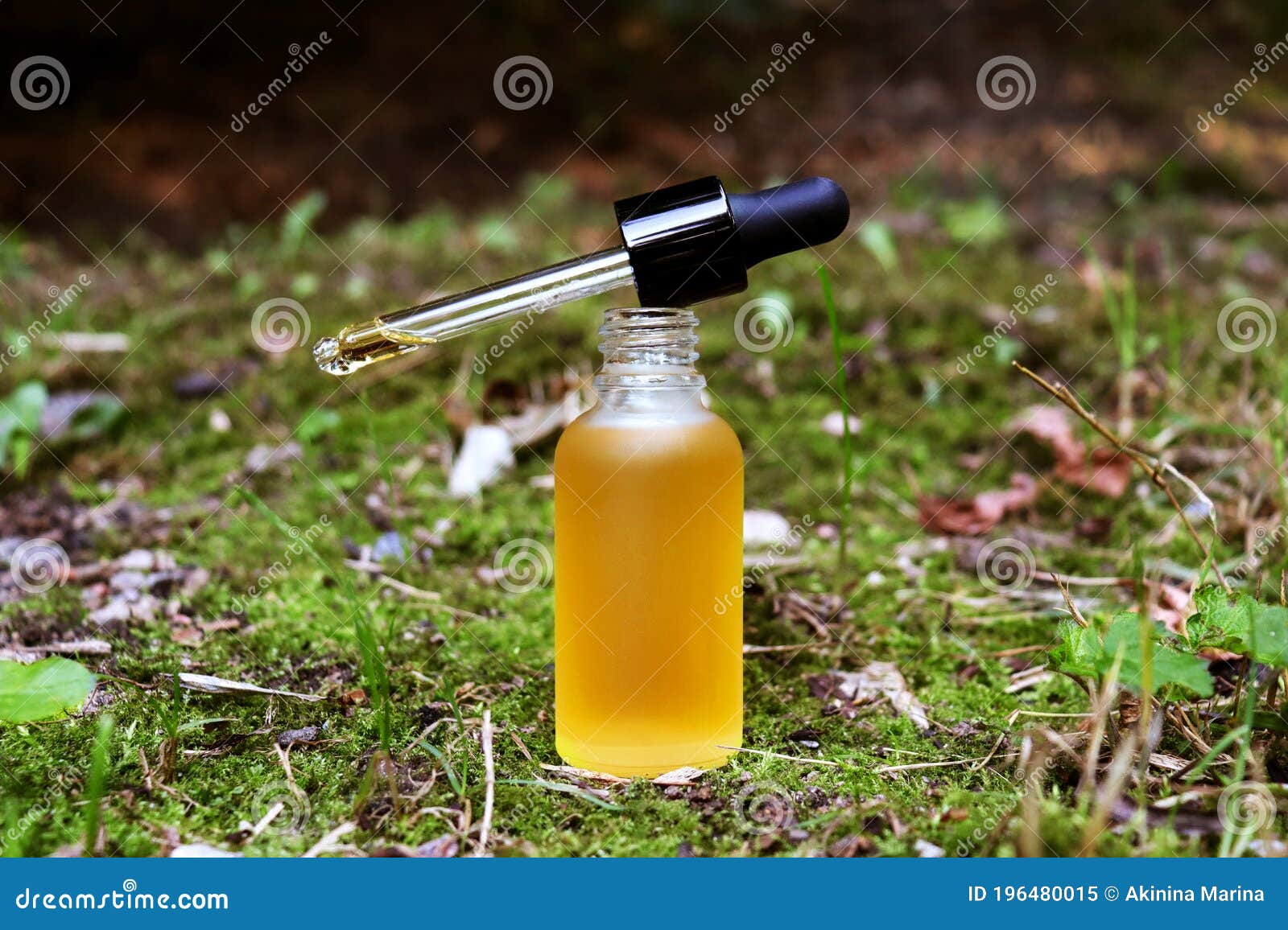 Download Mockup Of Dropper Oil Bottle, Wild Nature Background ...