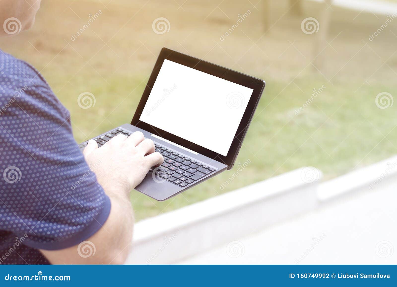 mockup image blank screen computer with white background for advertising text, hand using laptop contact business search informati