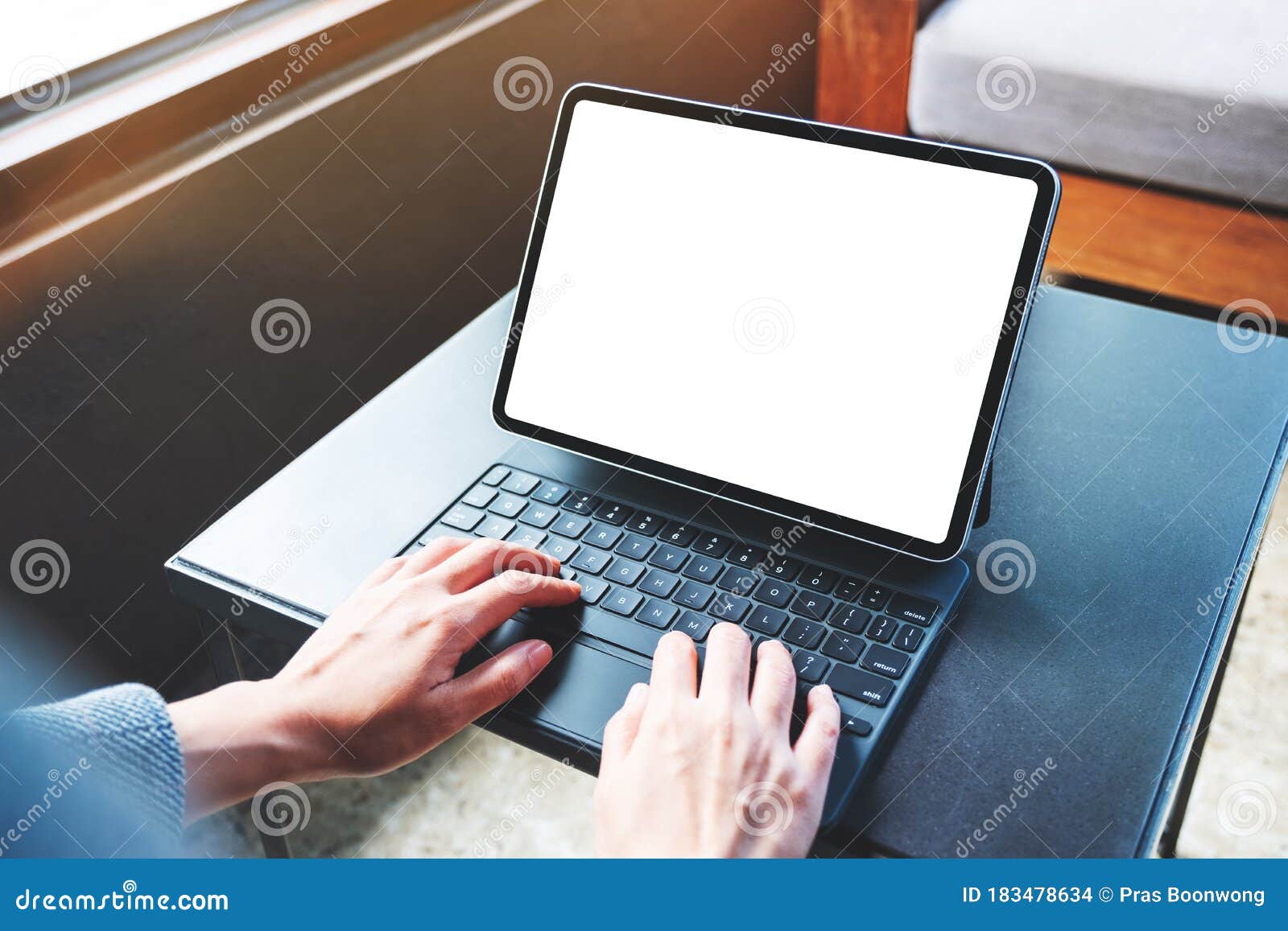 hands using and typing on tablet keyboard with blank white desktop screen as computer pc on the table stock photo image of business notebook 183478634