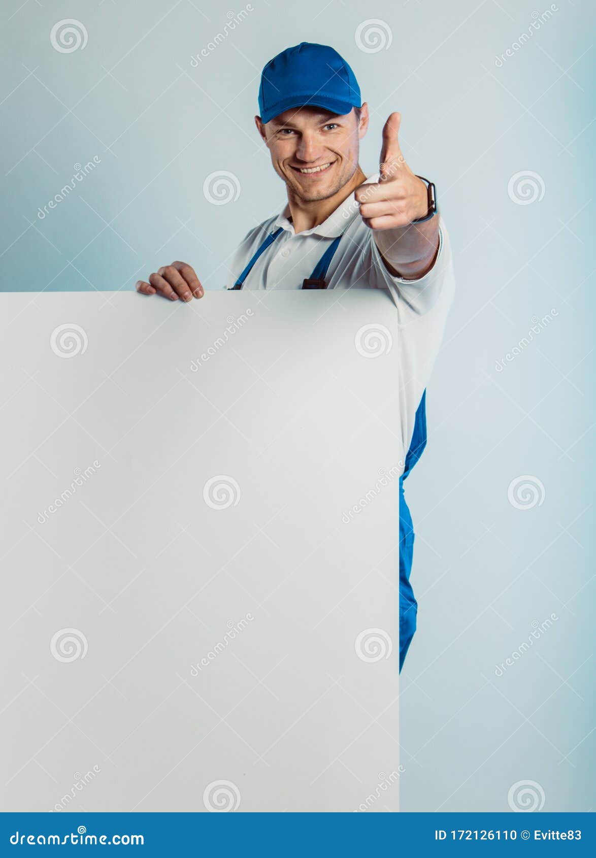Download Mockup Image Of Young Smiling Worker Man Wearing Blue ...