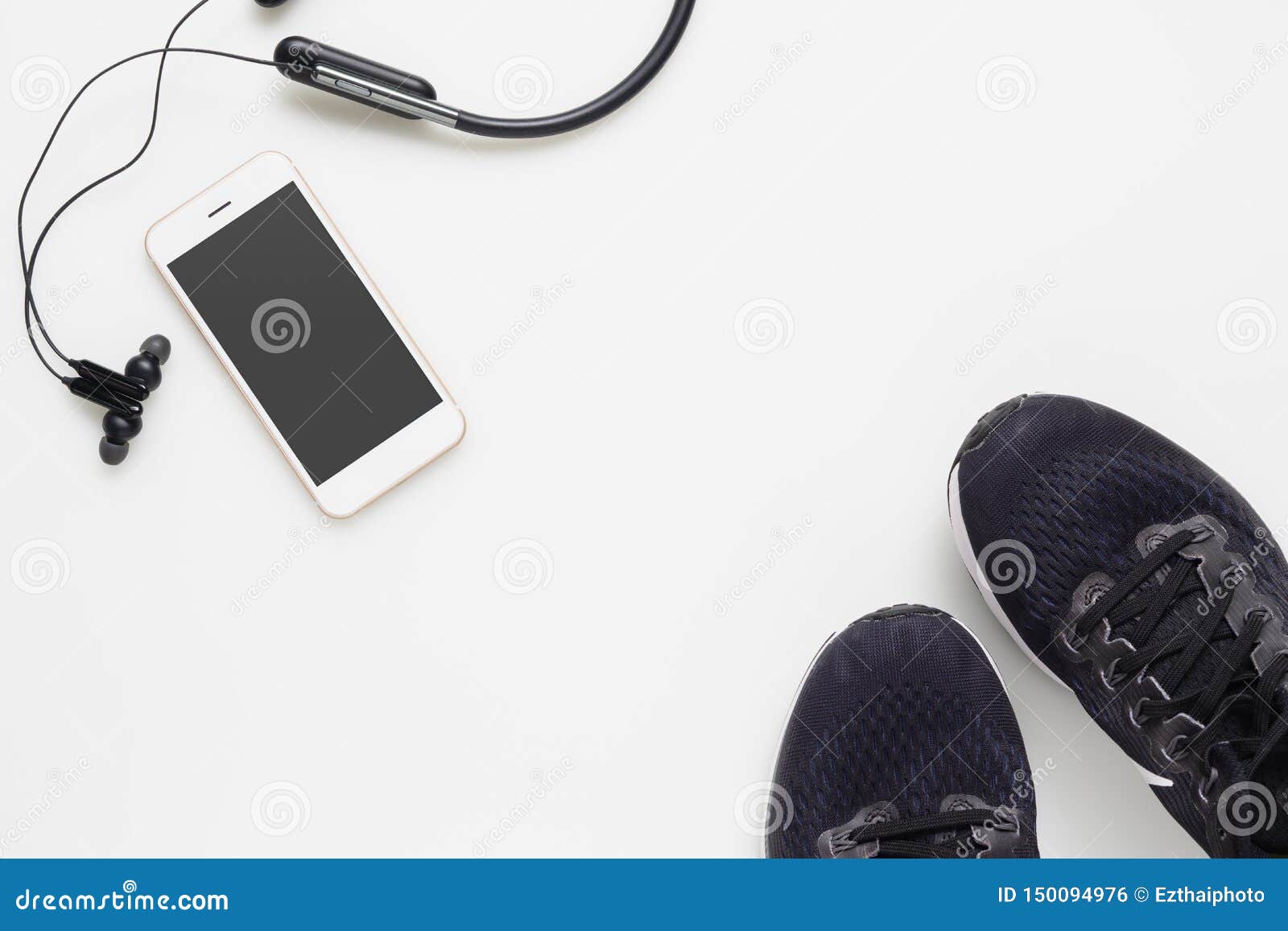 Download Mockup Mobile Cellphone With Wireless Bluetooth Earphone And Running Shoes On White Background Healthy Active Lifestyles Stock Photo Image Of Copy Headphones 150094976