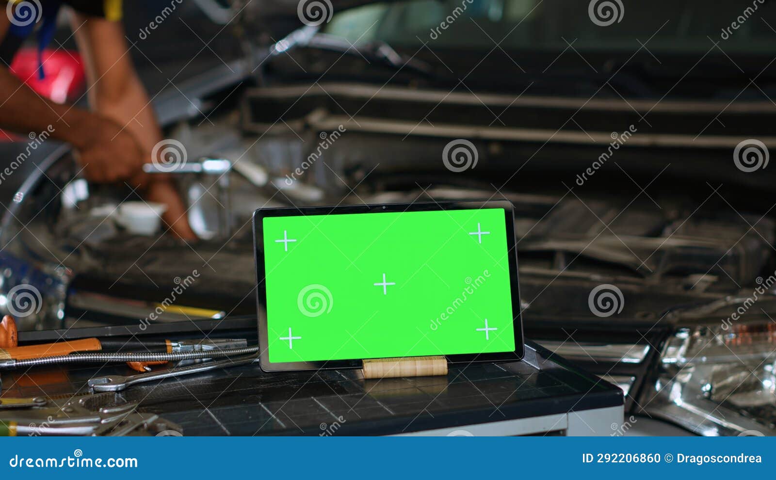 mockup tablet in garage next to expert