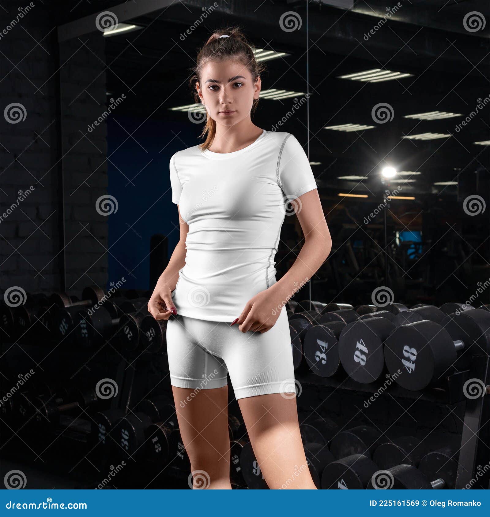 Mockup of a White Tracksuit on a Girl in the Gym, Empty