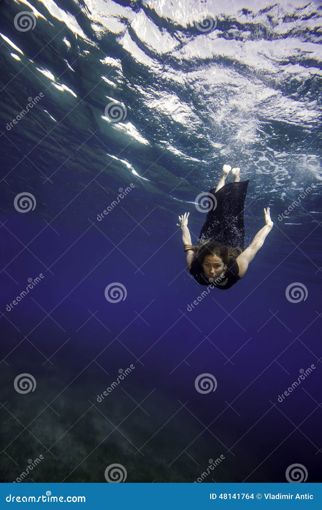 Model in Black Dress Diving Stock Photo - Image of stunning, super ...