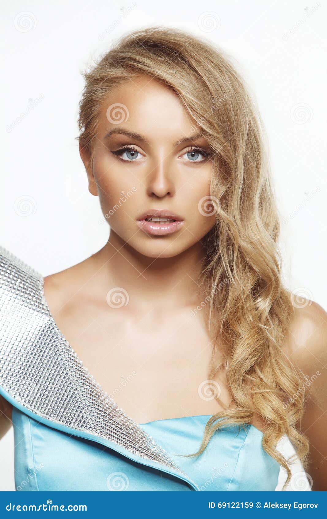 Model in a blue dress stock image. Image of elegance - 69122159