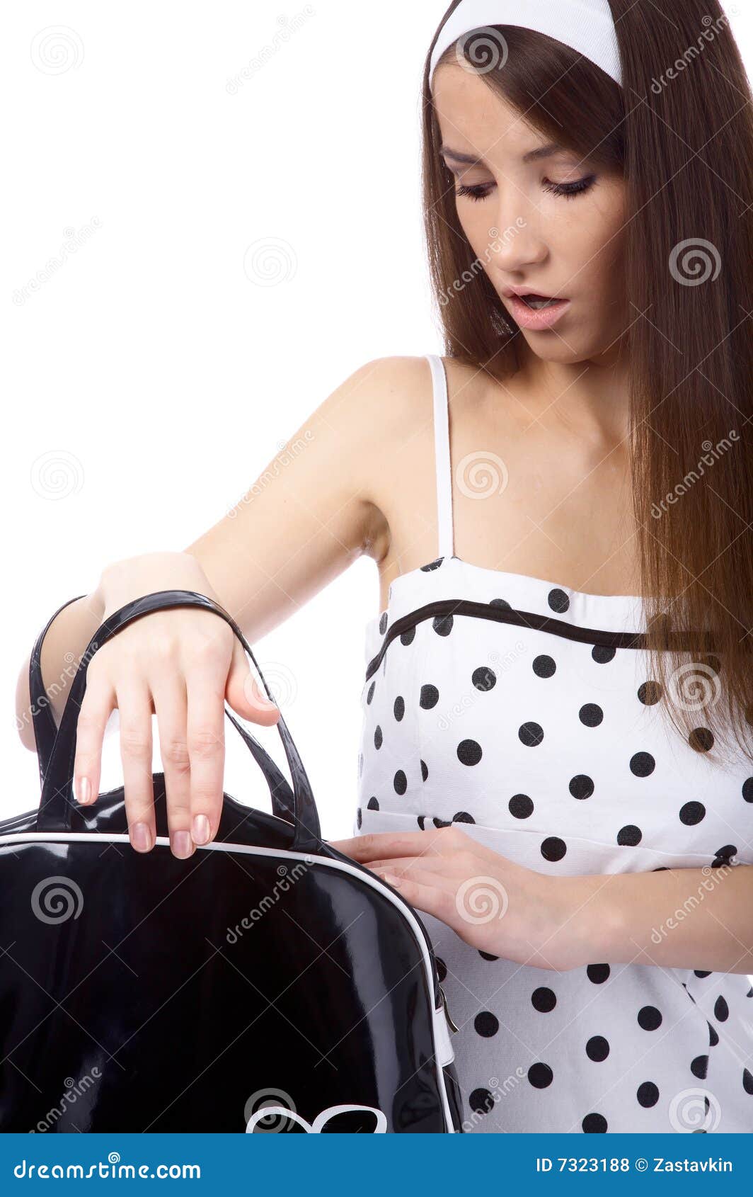 Model checking her bag stock photo. Image of beauty, look 7323188