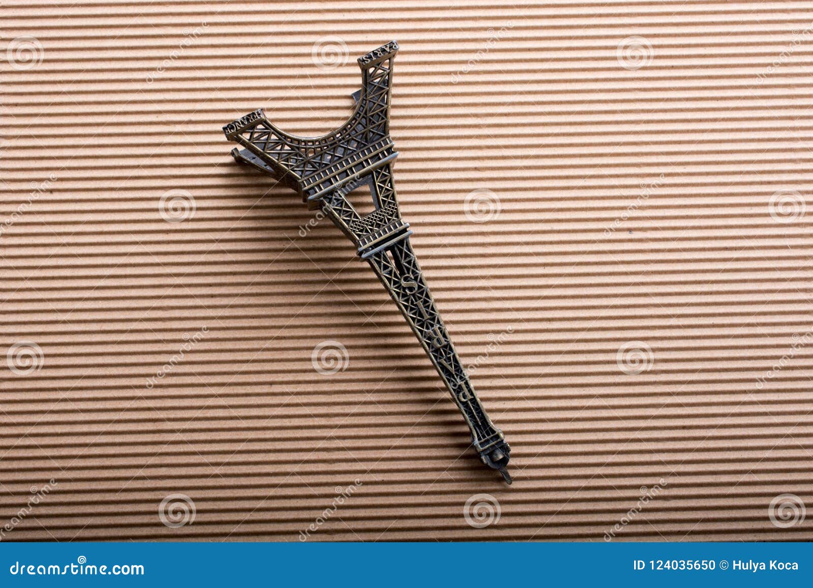 Model Eiffel Tower is on Cardboard Stock Photo - Image of europe, paris