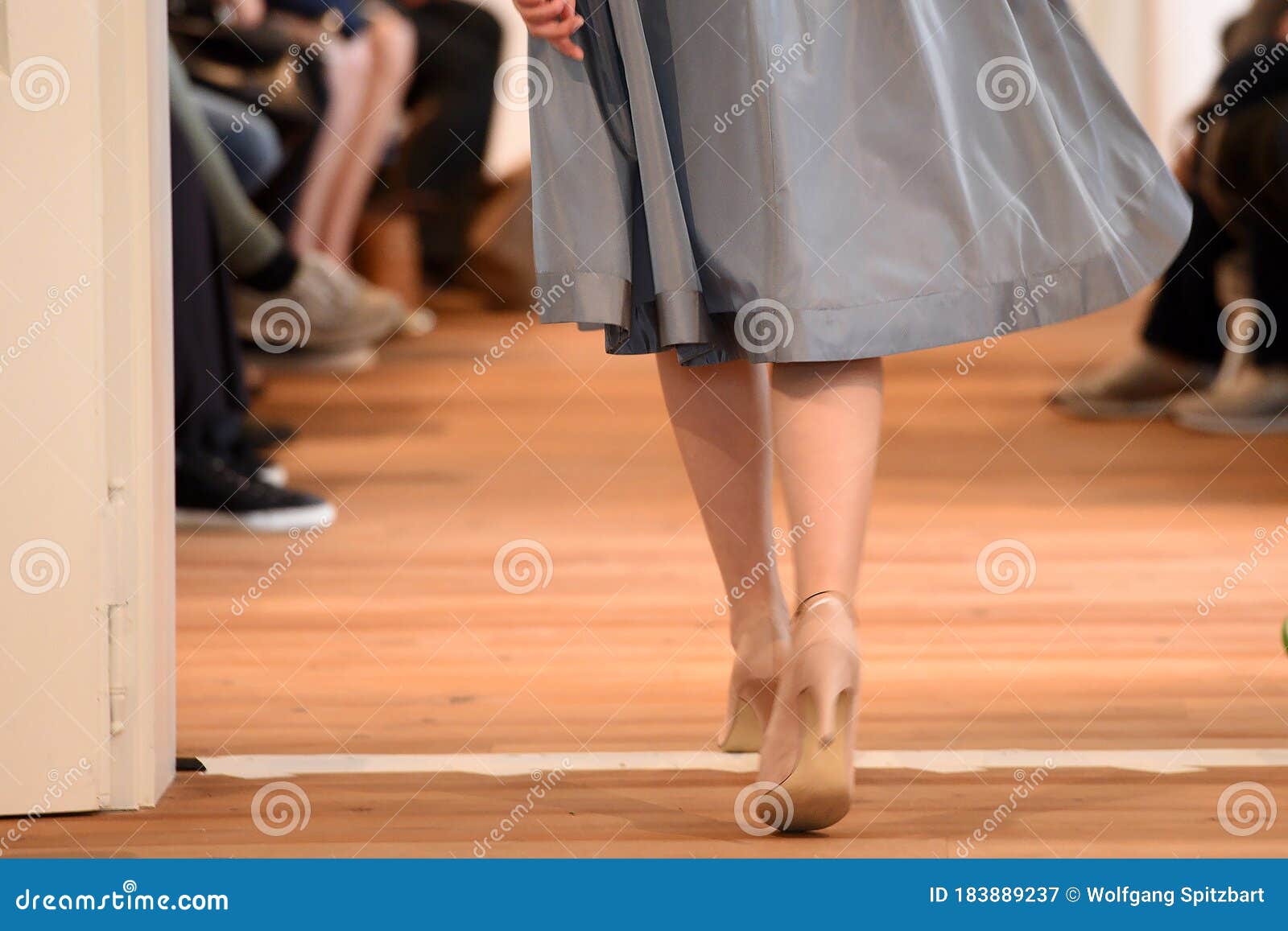 model at fashion show from behind