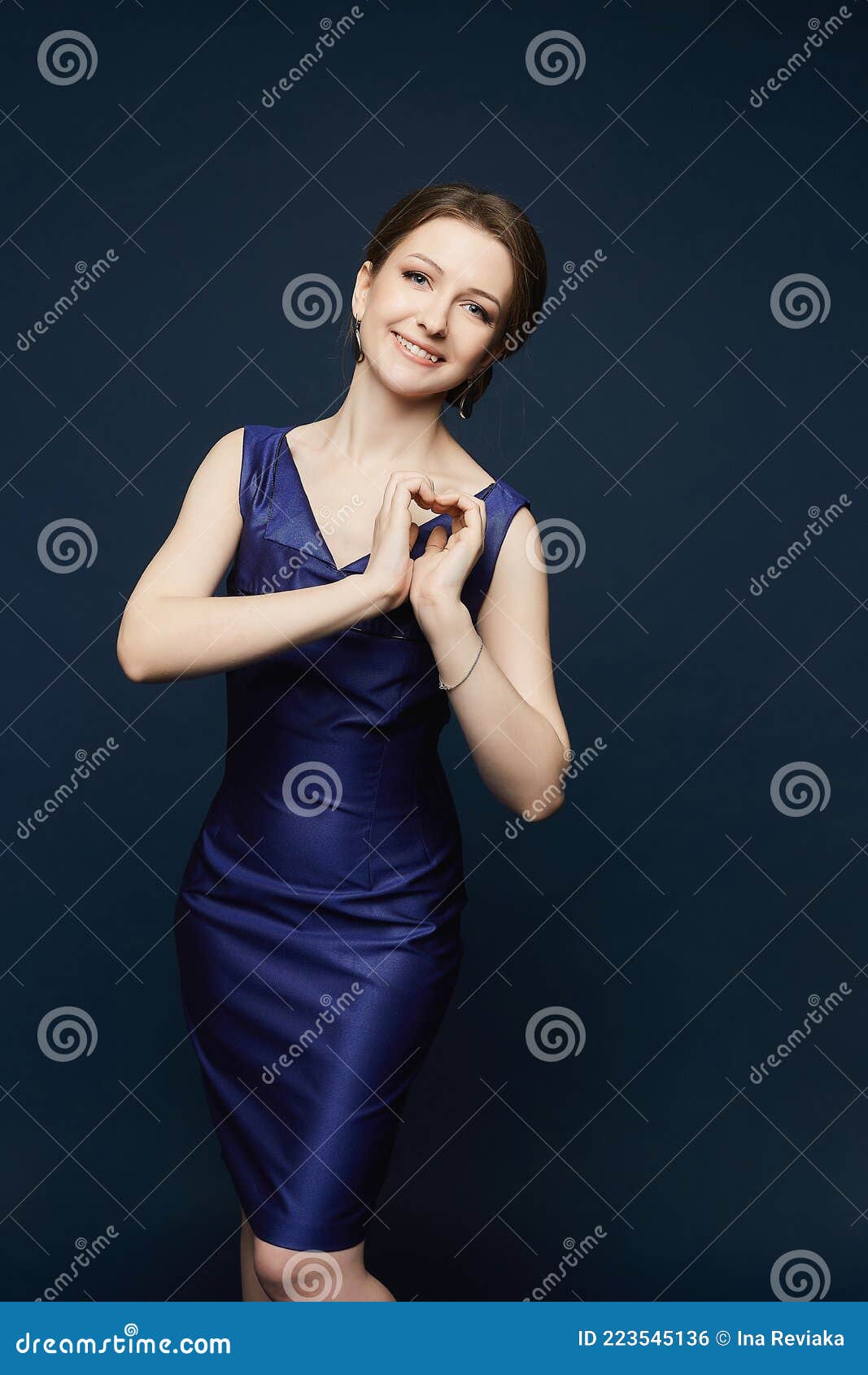 Model Girl in Blue Dress Showing Heart ...