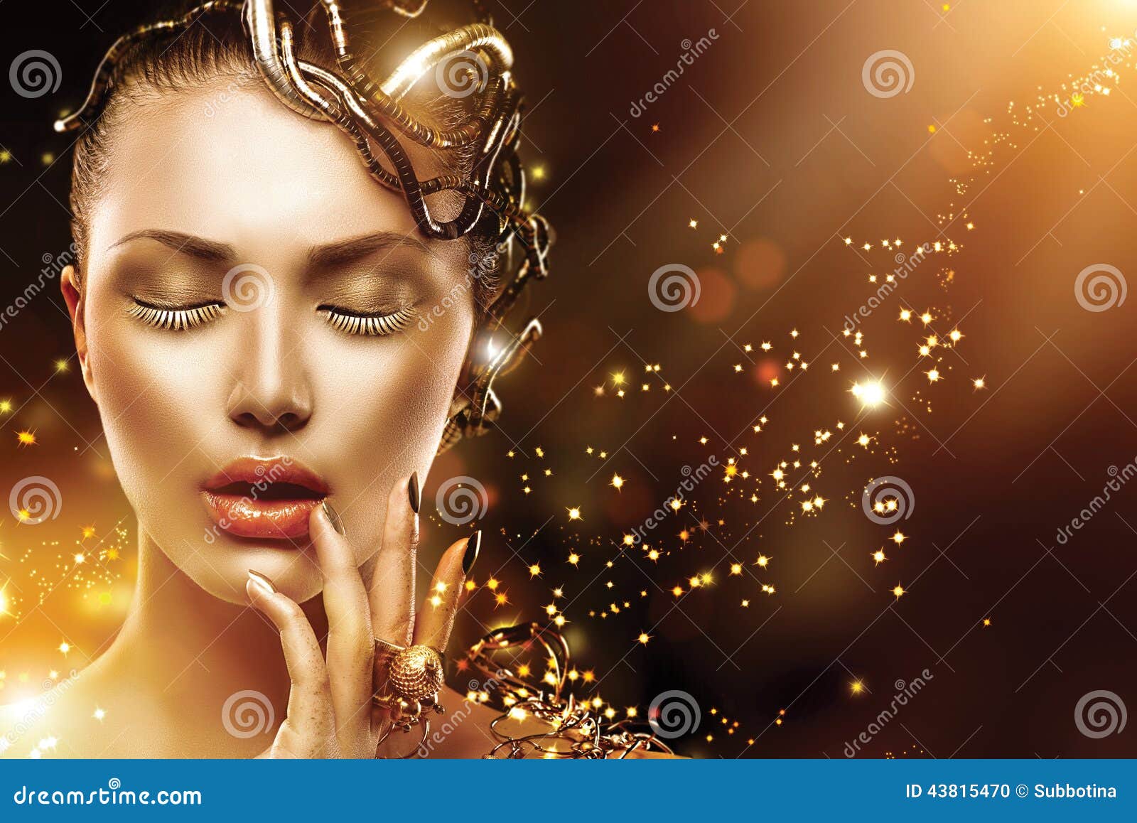 model girl face with gold make-up and accessories
