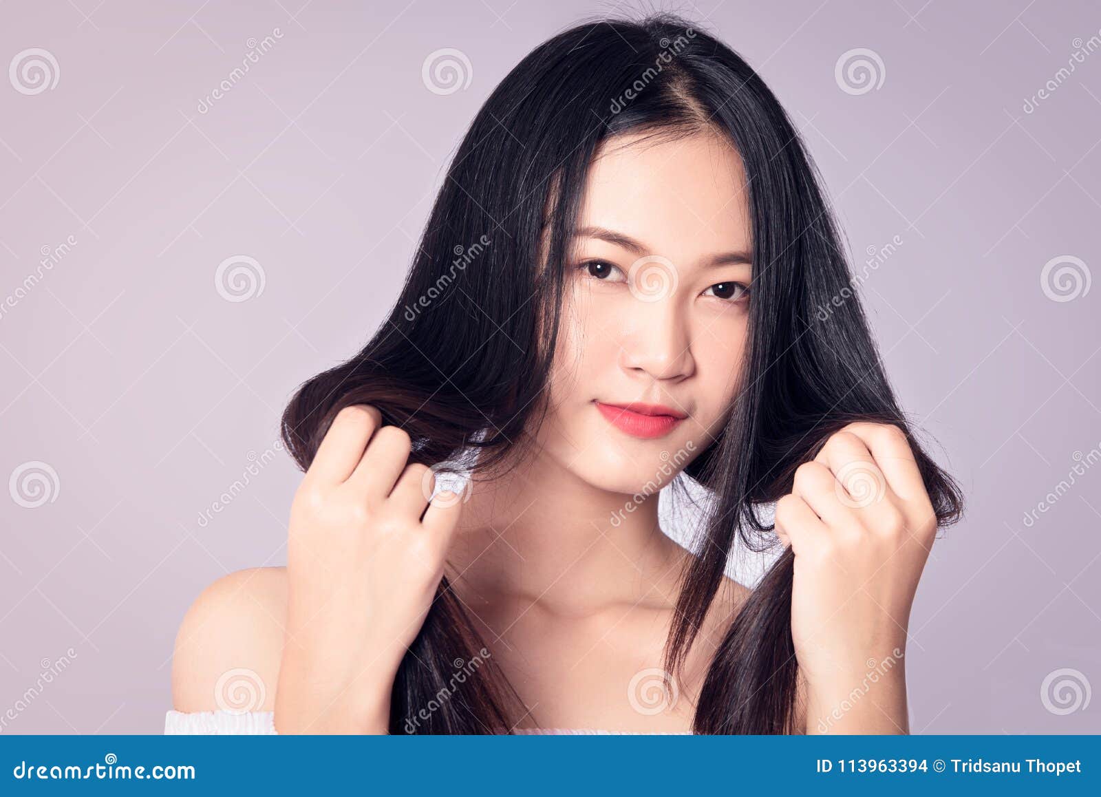 https://thumbs.dreamstime.com/z/model-holding-hair-beautiful-thai-model-isolated-white-background-113963394.jpg