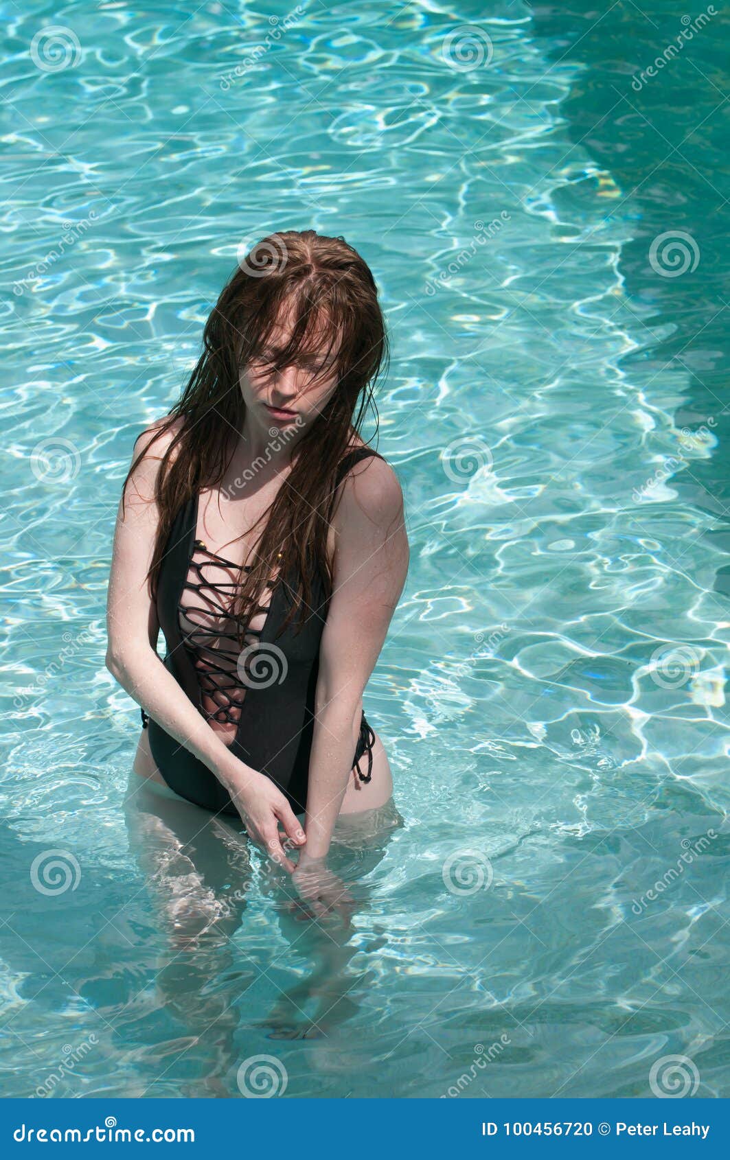 https://thumbs.dreamstime.com/z/model-long-hair-pool-above-below-water-woman-red-hair-below-above-surface-100456720.jpg