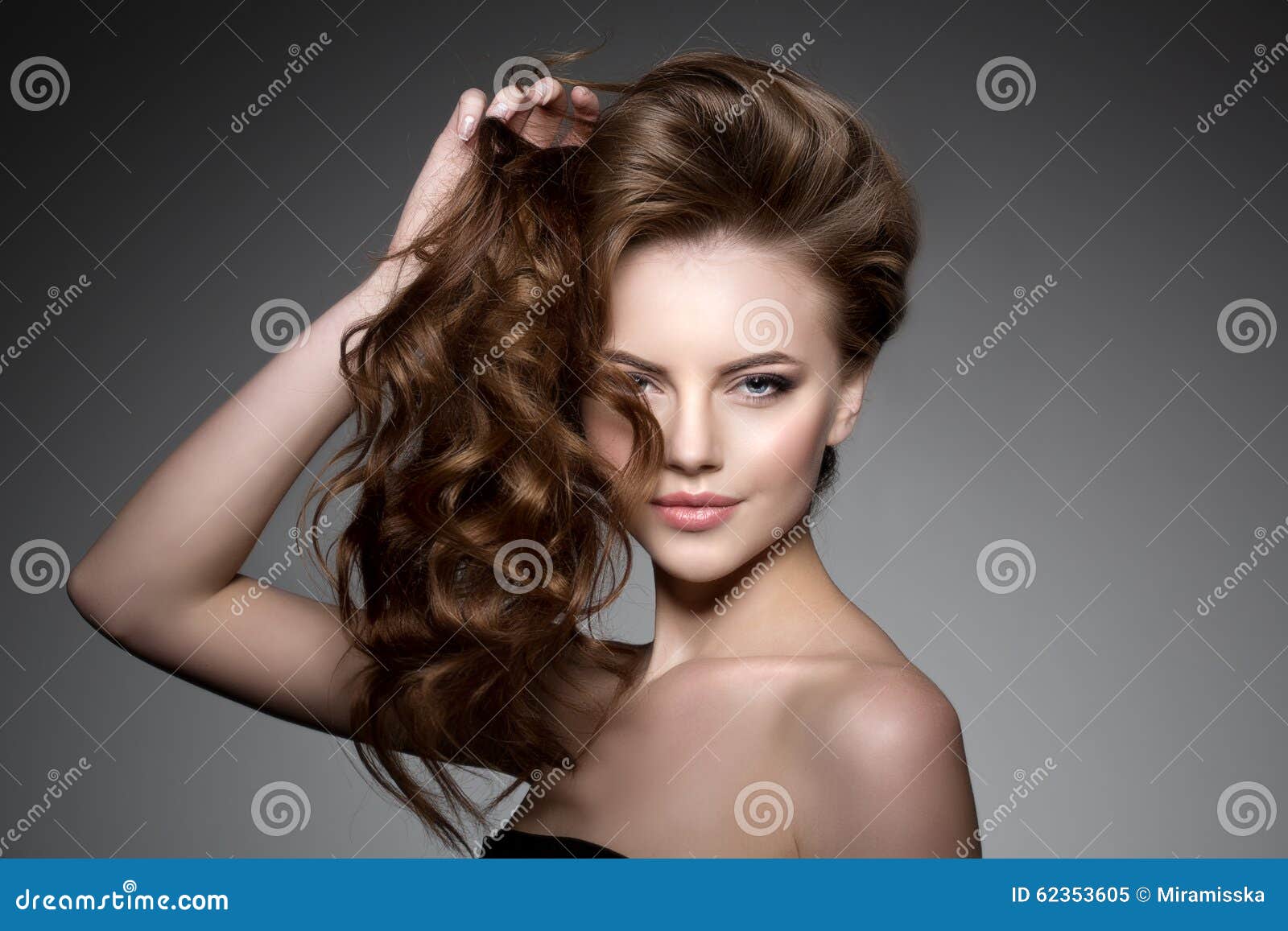 model with long hair. waves curls hairstyle. hair salon. updo. f