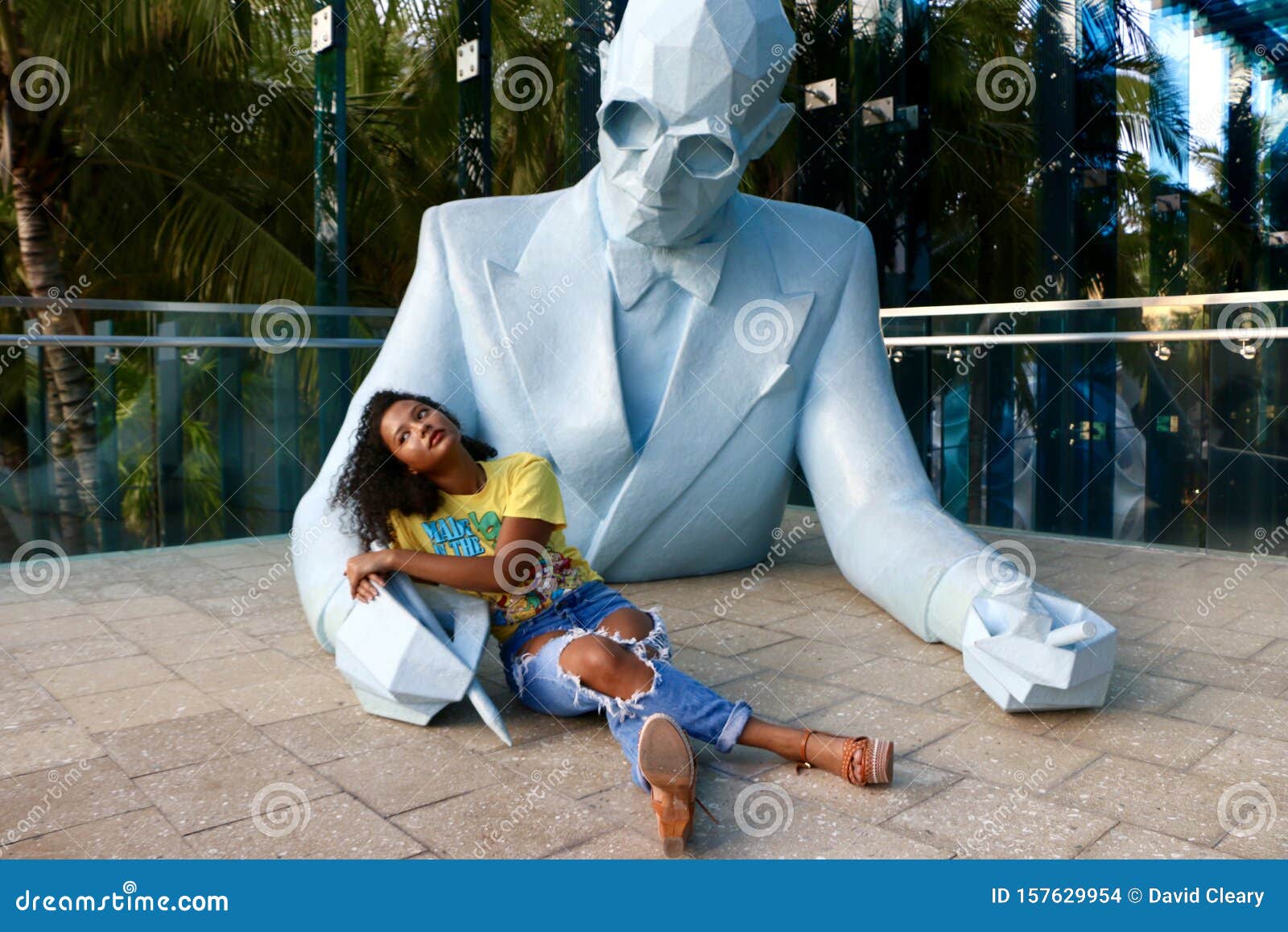 Model Poses on Statue editorial stock image. Image of beautiful 157629954