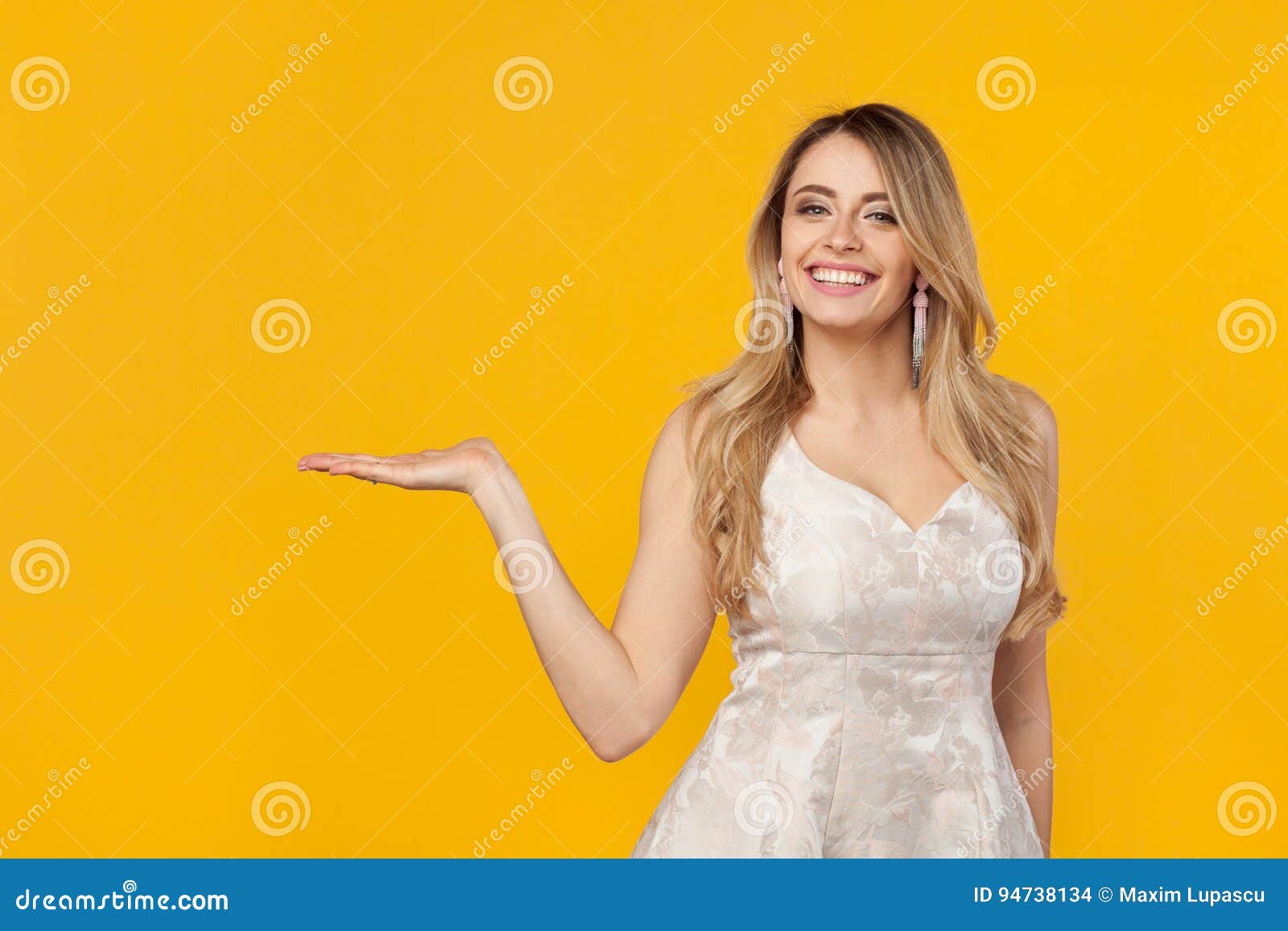 Model Posing And Holding One Hand Up Stock Photo Image Of Trendy Expression