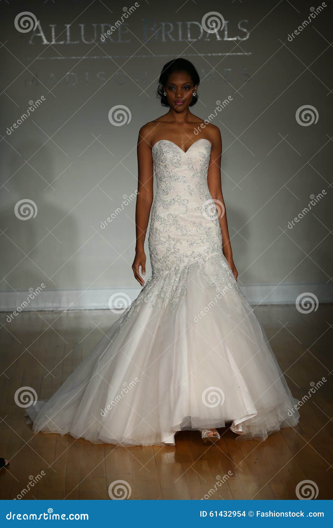 A Model Walks at Allure Bridals Fall/Winter 2016 Runway Show Editorial ...